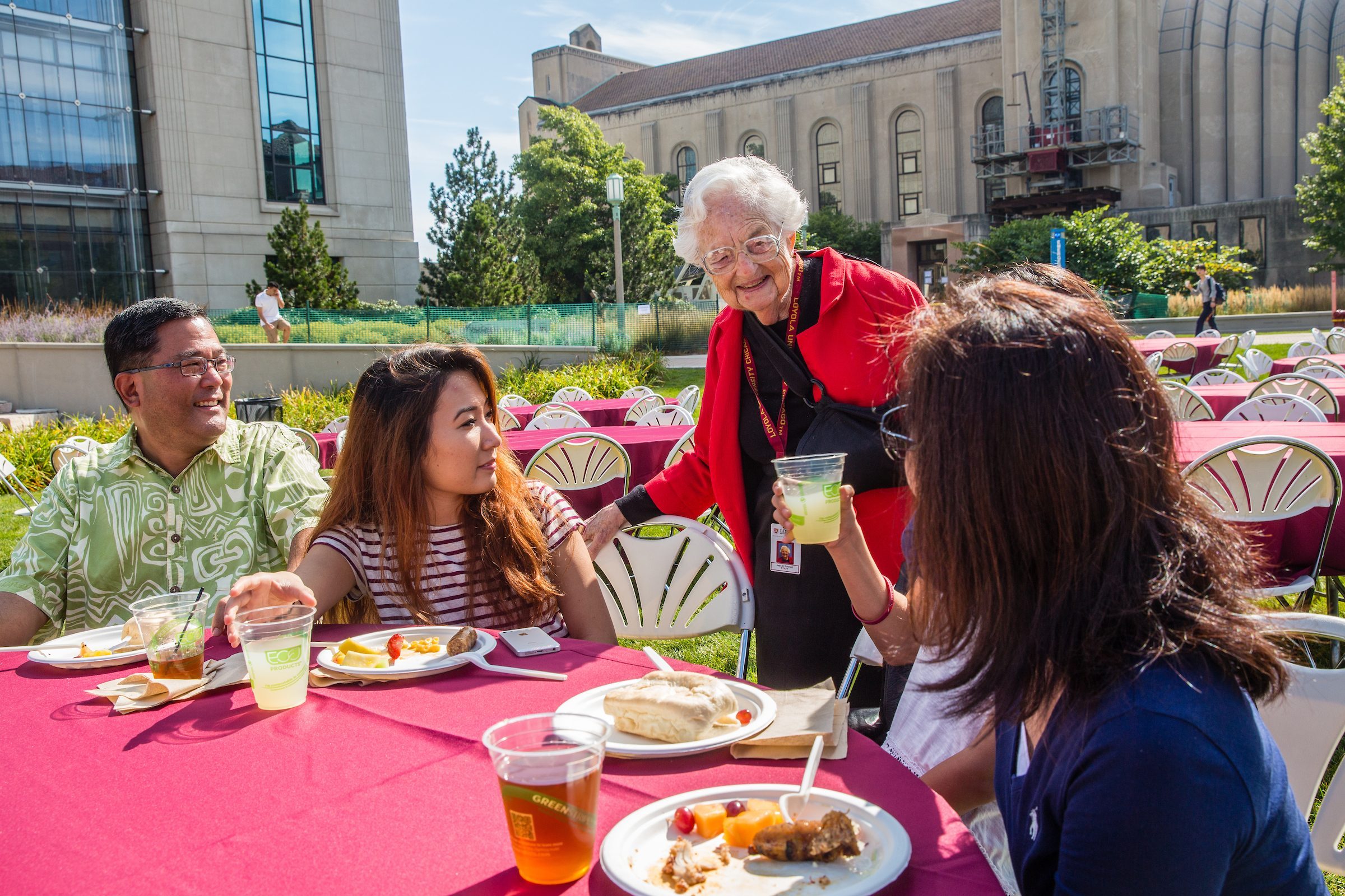 Jean Dolores Schmidt, BVM, greets the Tanaka family, from left, Steve, Katie, (a freshman at Loyola) her sister Holly, and mother, Patricia during the Family Weekend Family BBQ on the East Quad of the Lake Shore Campus Saturday, September 27, 2014. The family traveled from Hawaii to visit Katie. ( photo by Natalie Battaglia)
Jean Dolores Schmidt, BVM, greets the Tanaka family, from left, Steve, Katie, (a freshman at Loyola) her sister Holly, and mother, Patricia during the Family Weekend Family BBQ on the East Quad of the Lake Shore Campus Saturday, September 27, 2014. The family traveled from Hawaii to visit Katie. ( photo by Natalie Battaglia)