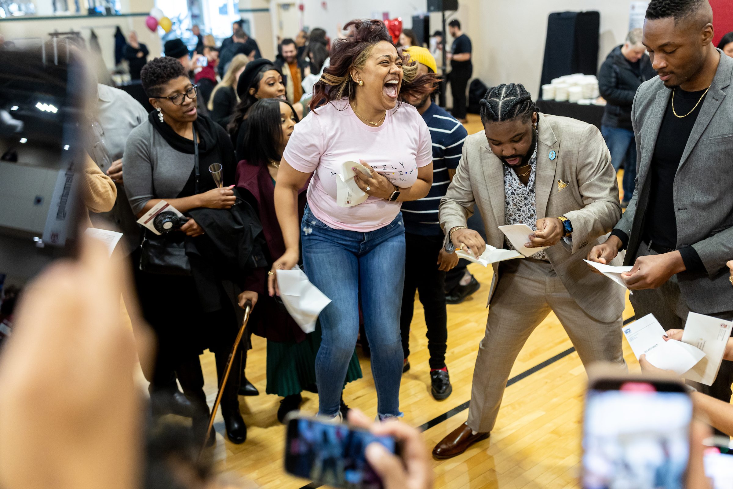 Students react as they receive their residency matches during Loyola University Chicago Stritch School of Medicine's Match Day celebration in Maywood on Friday, March 15, 2024. (Photo by: Lukas Keapproth)