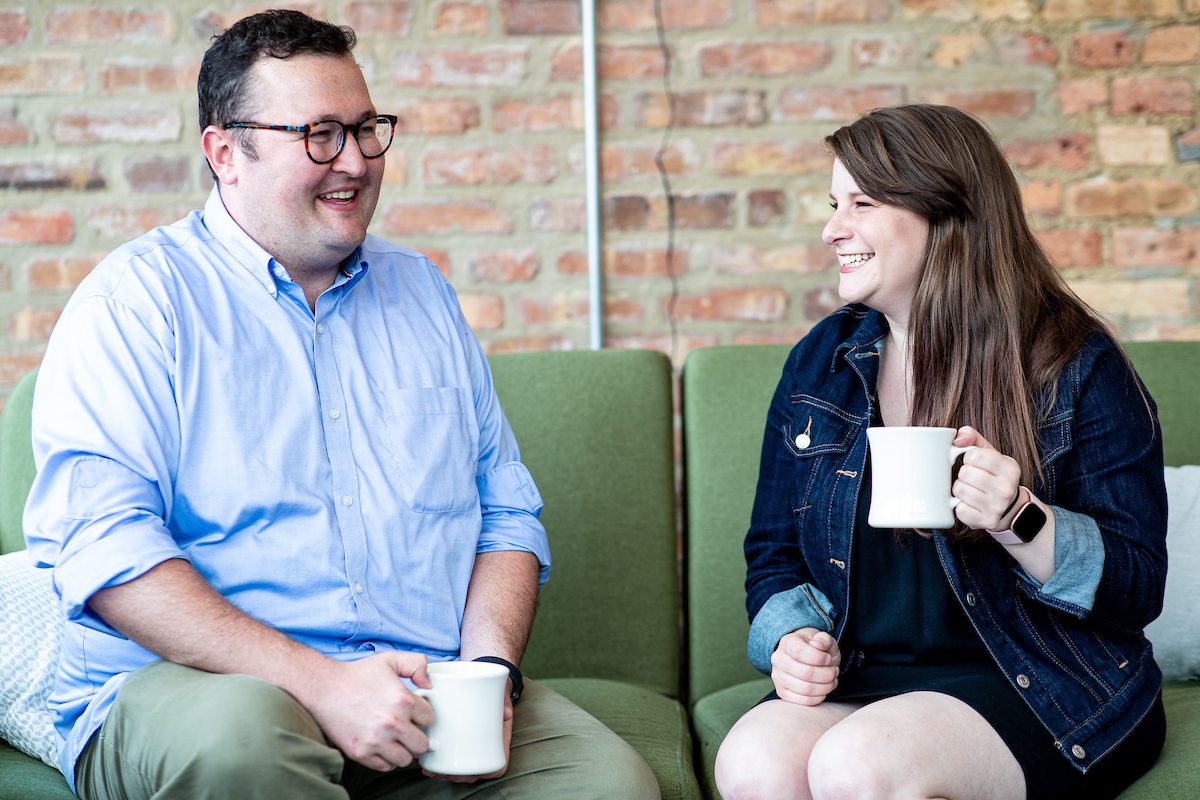 Loyola University Chicago alumni Sean Connolly and Caitlin Botsios at Helix Cafe, a non-profit organization and community space they founded to offer young adults real world educational and cultural experiences. (Photo by: Lukas Keapproth)