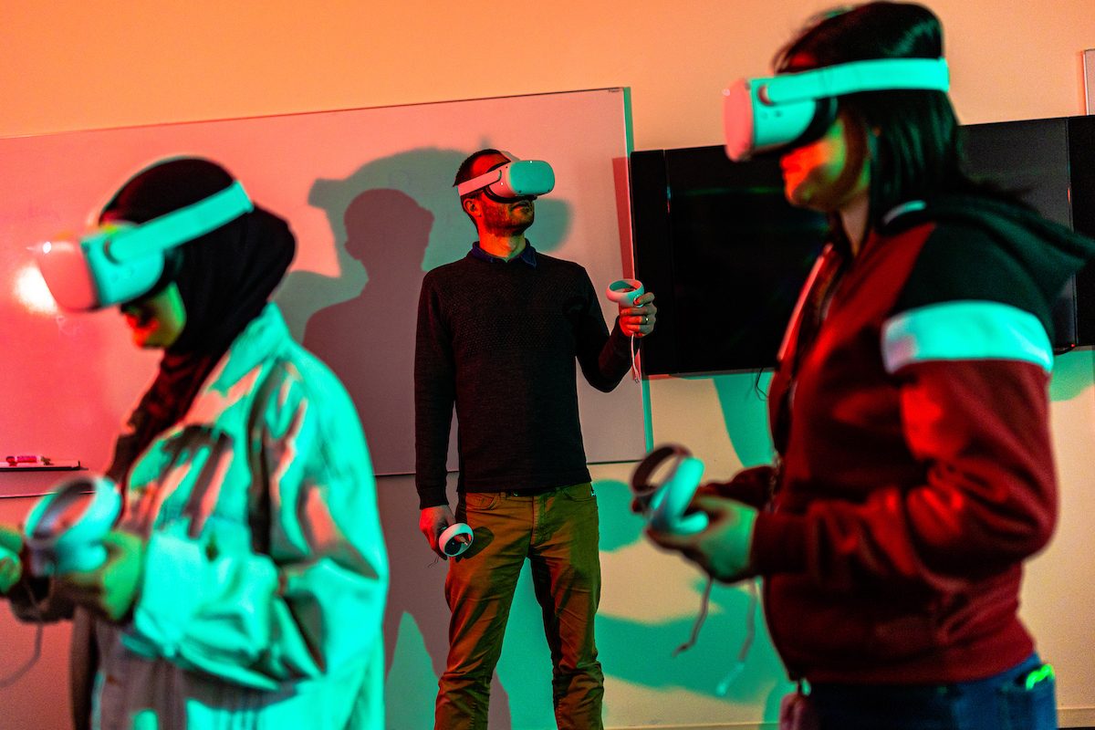 Professors Joseph Vukov and Michael Burns conduct a course on virtual reality from both a technological and philosophical perspective. Vukov, a philosophy professor, researches the intersection of relgion and science, while Burns, a molecular biologist, looks at the physical effects of the technology. (Photo: Lukas Keapproth)