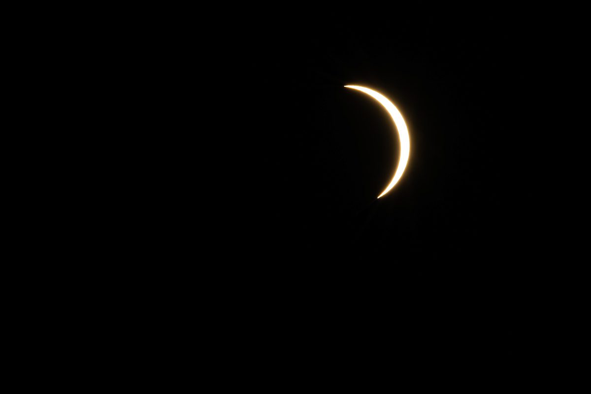 The Loyola University Chicago community gathered at the Lake Shore Campus to witness the historic, near total solar eclipse on April 8, 2024. (Photo: Lukas Keapproth) A closeup of a near total solar eclipse