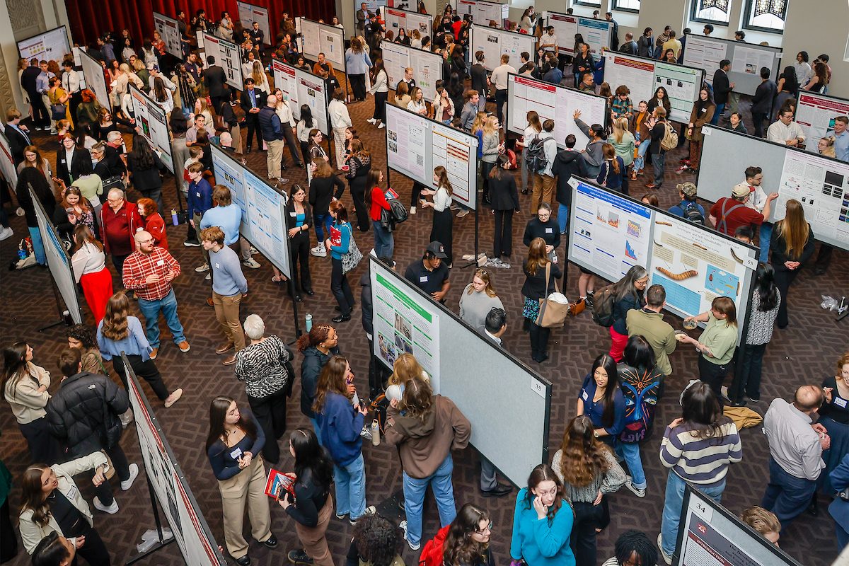 Poster Session 2
Undergraduate Research and Engagement Symposium at Loyola University, April 20, 2024. Loyola University Chicago students gathered in a large room with rows of presentation boards