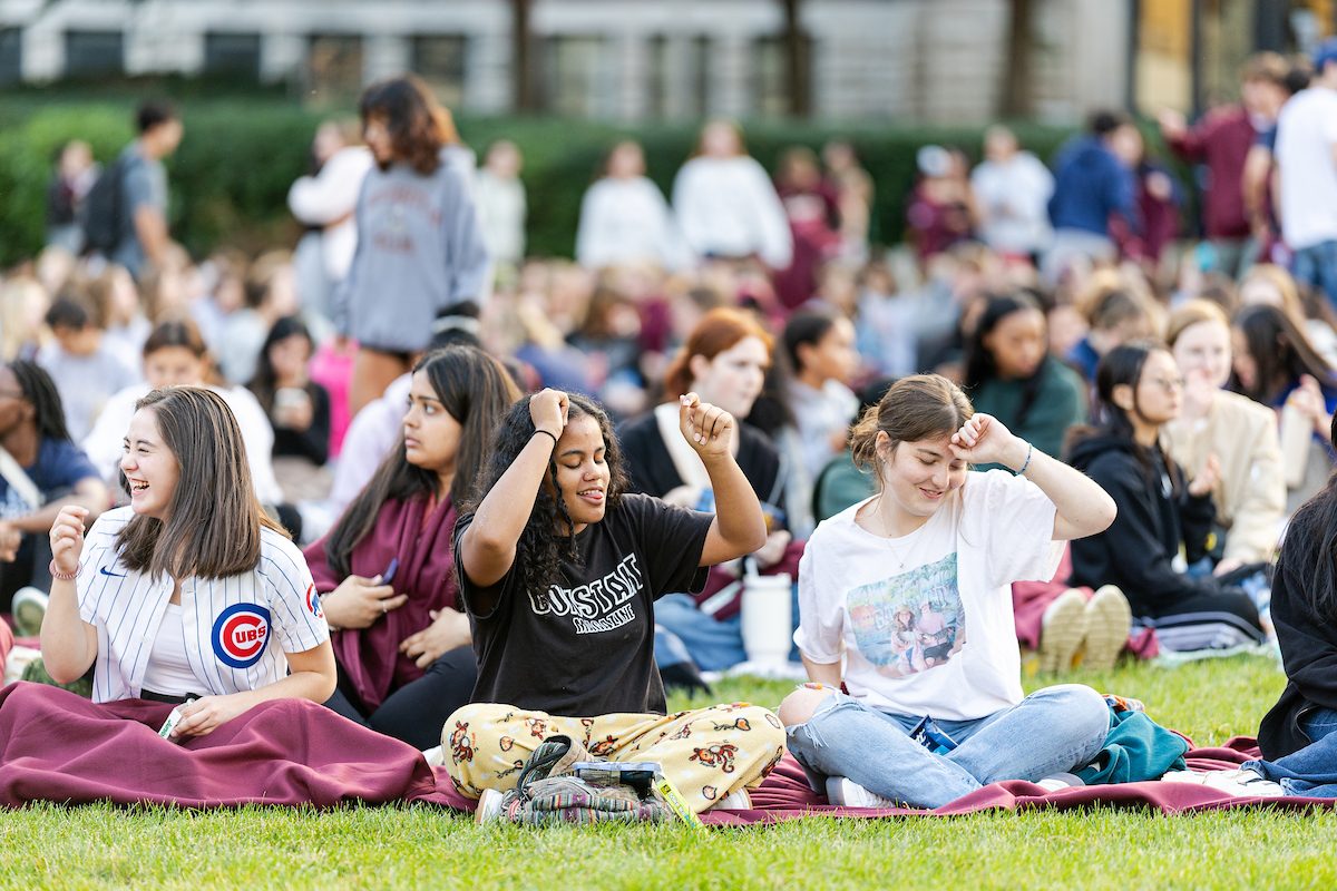 Loyola University Chicago students attend Movie on the Quad as part of Welcome Week festivities, August 21, 2024. (Photo by: Lukas Keapproth)