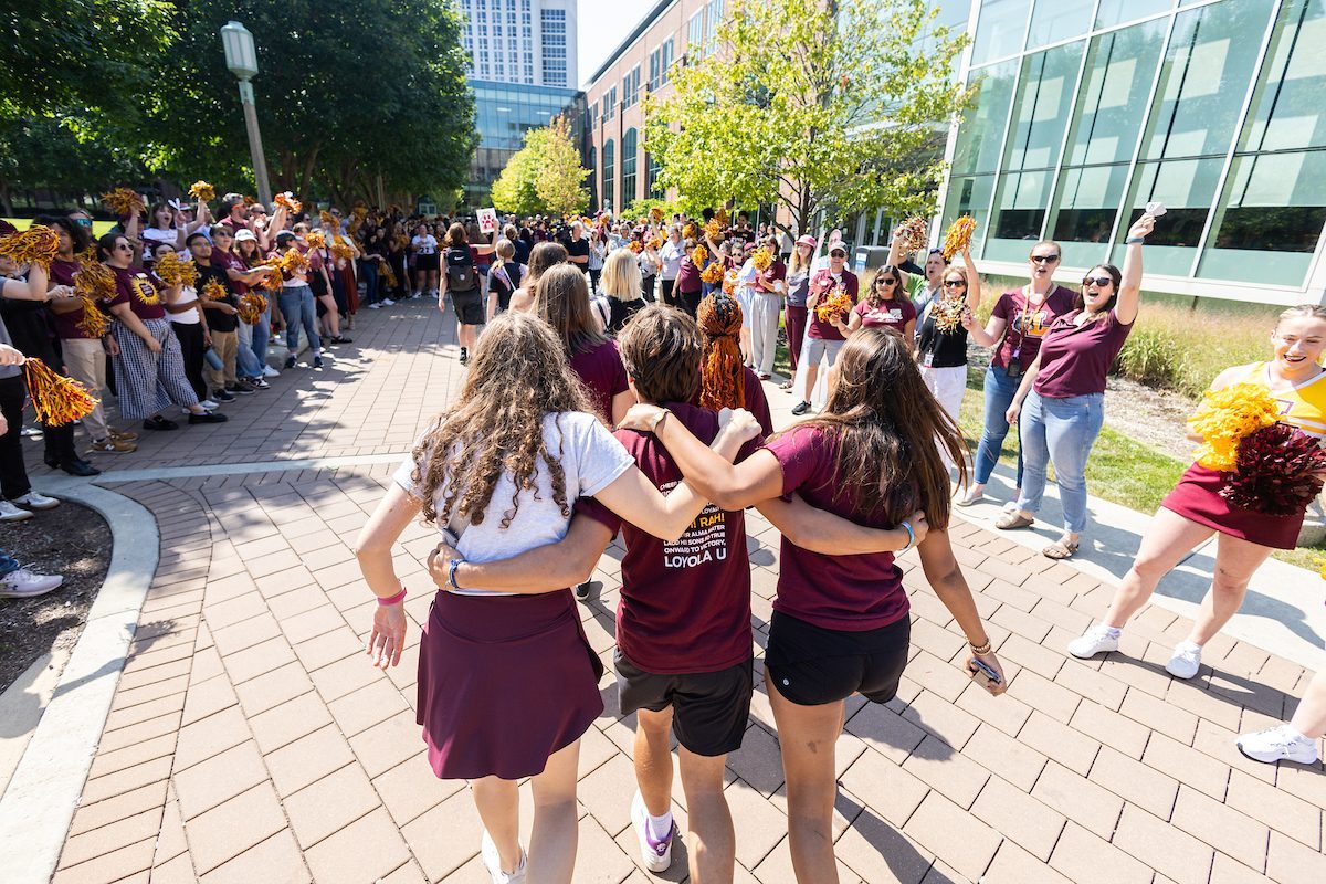 The Loyola University Chicago community welcomes the Class of 2028 during the New Student Convocation Walk on August 23, 2024. (Photo by: Lukas Keapproth)