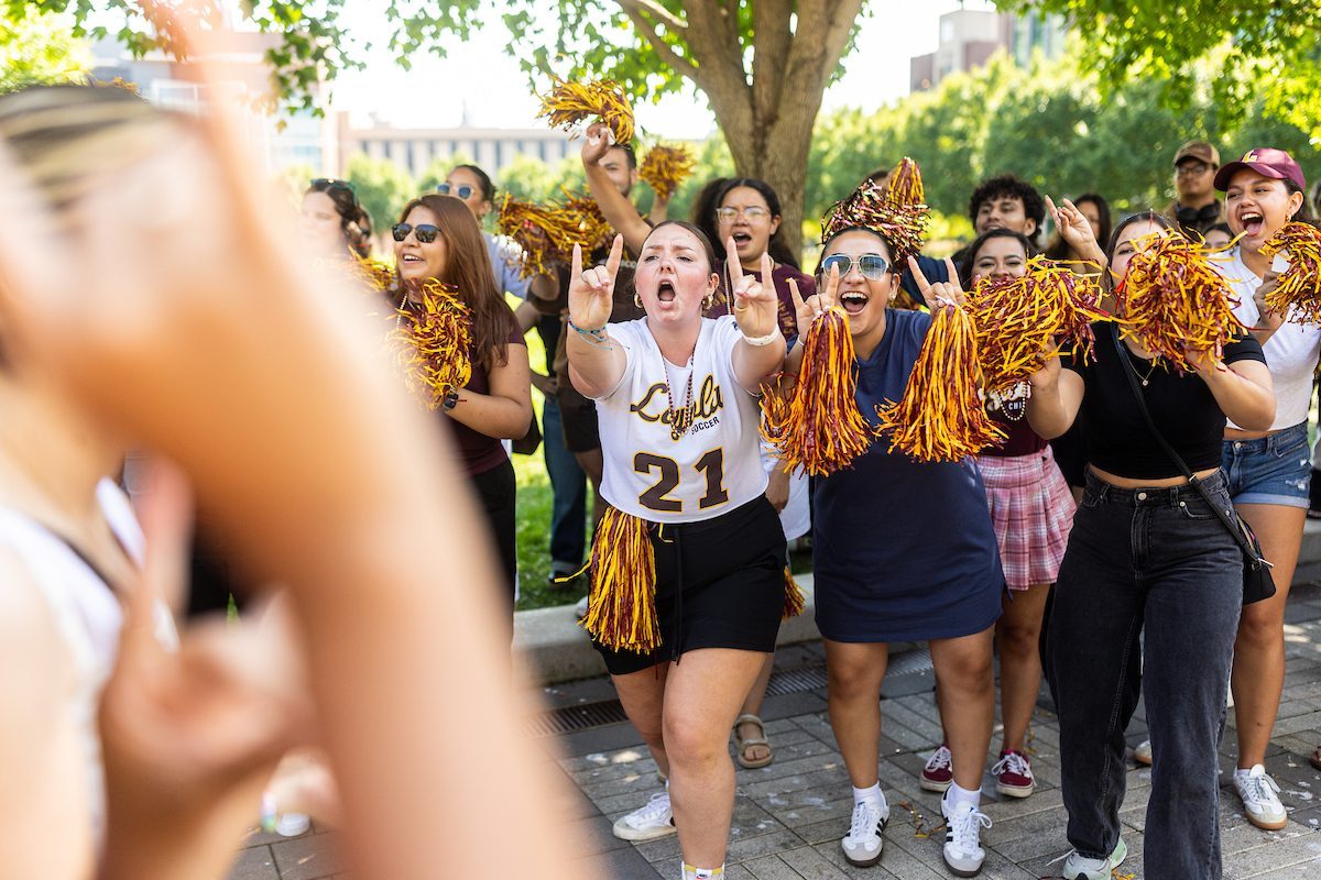 The Loyola University Chicago community welcomes the Class of 2028 during the New Student Convocation Walk on August 23, 2024. (Photo by: Lukas Keapproth)