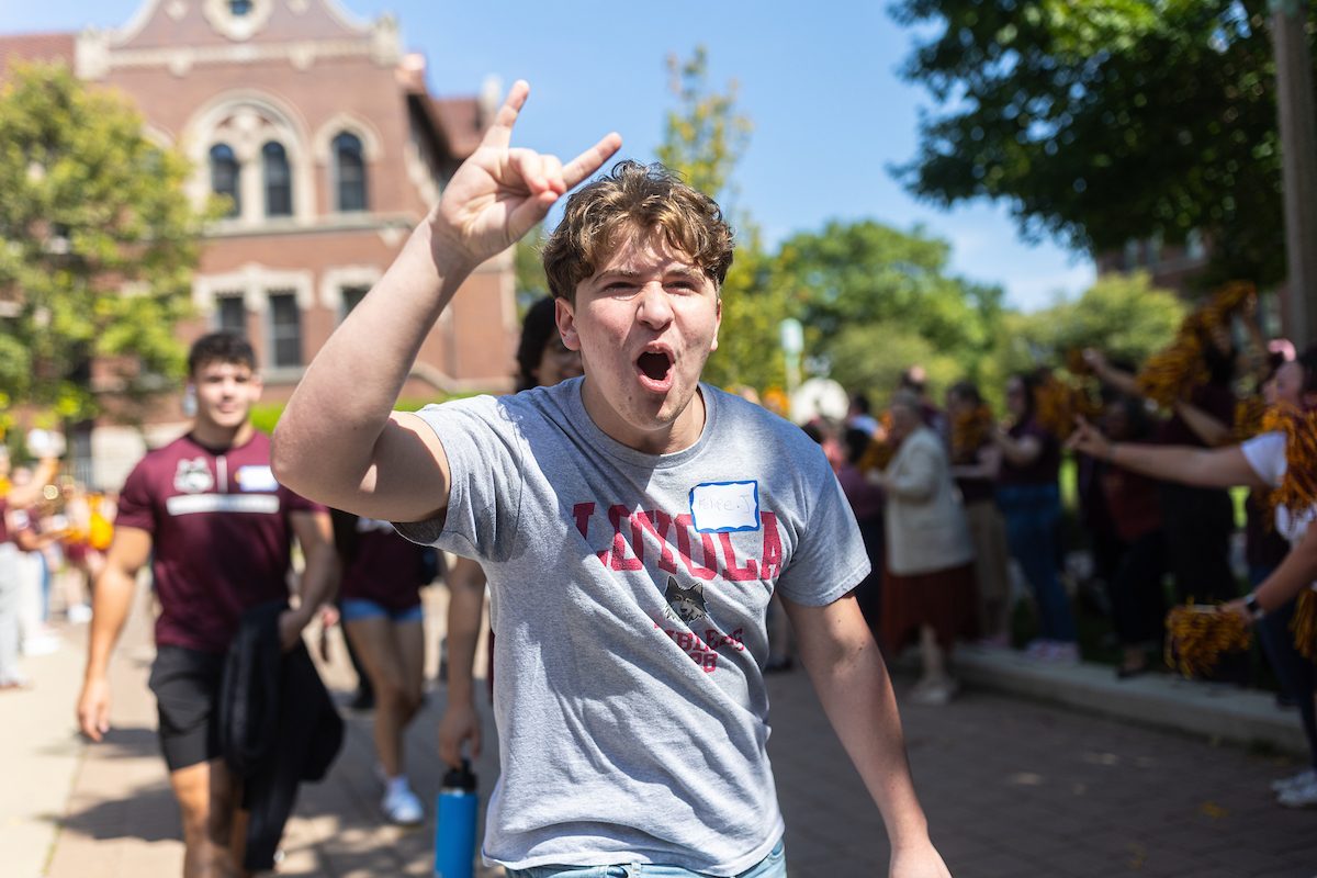 The Loyola University Chicago community welcomes the Class of 2028 during the New Student Convocation Walk on August 23, 2024. (Photo by: Lukas Keapproth)