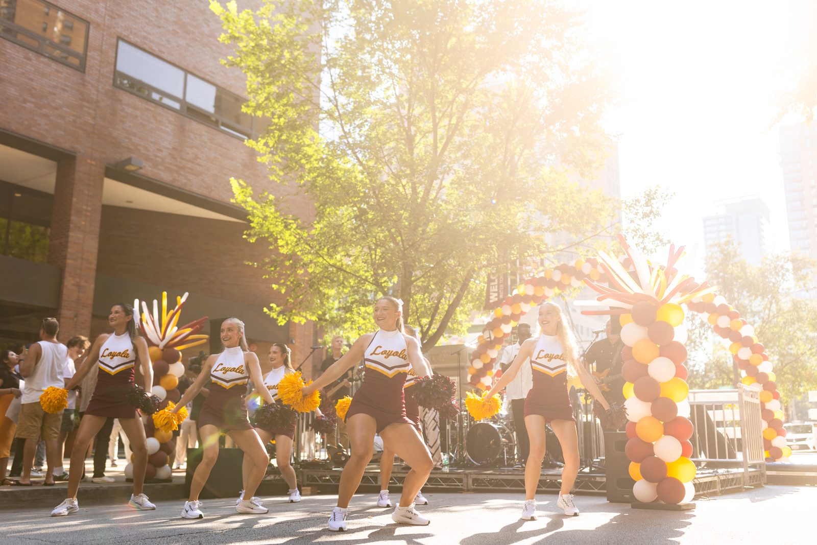 The Loyola University Chicago community gathers for the annual Water Tower Campus Block Party to kick off the fall semester, August 29, 2024. (Photo by: Lukas Keapproth)