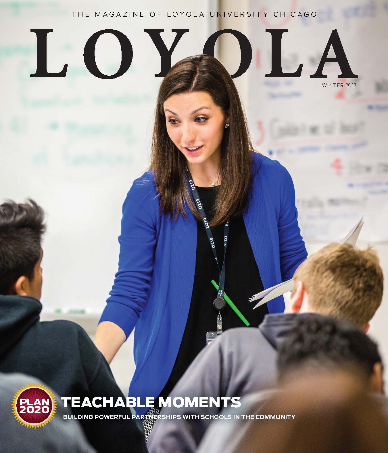 Loyola magazine cover showing a woman wearing a blue cardigan and teaching students with a whiteboard in the background