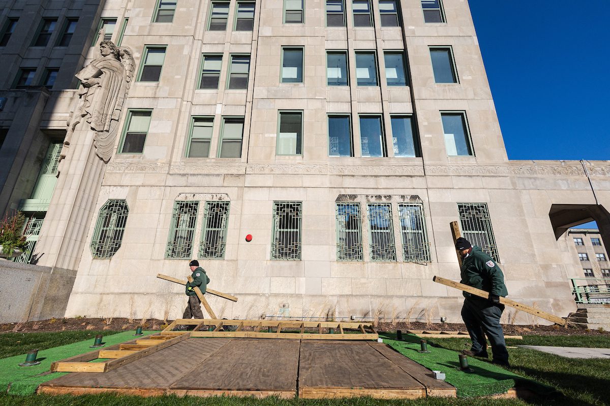 Workers in the Facilities Department begin constructing the manger scene along Sheridan Avenue as well as placing the three wisemen around campus to symbolize their journey to Jesus' birthplace in preparation for Christmas. (Photo: Lukas Keapproth)