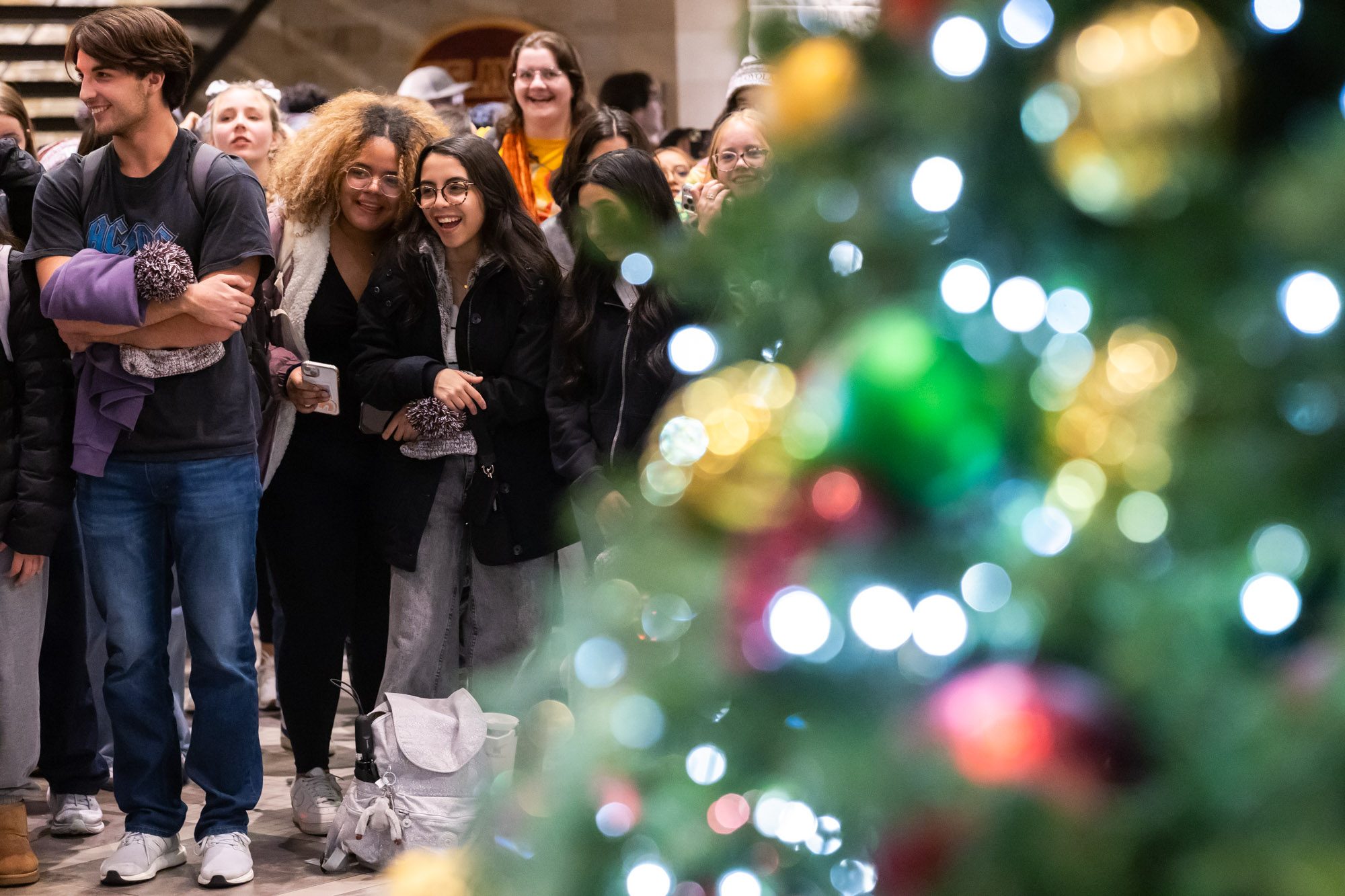 Loyola University Chicago students enjoy the annual Damen Tree Lighting ceremony at the Damen Student Center on November 20, 2024 (Photo: Lukas Keapproth)