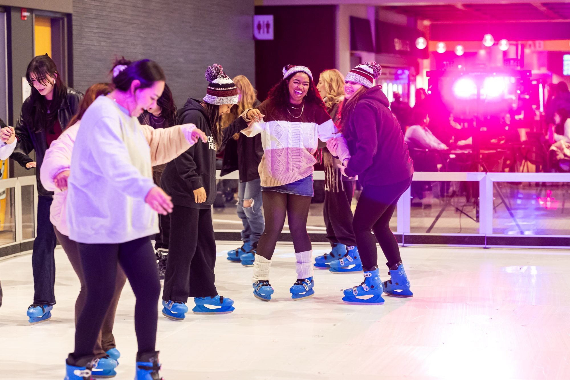 Loyola University Chicago students enjoy the annual Damen Tree Lighting ceremony at the Damen Student Center on November 20, 2024 (Photo: Lukas Keapproth)