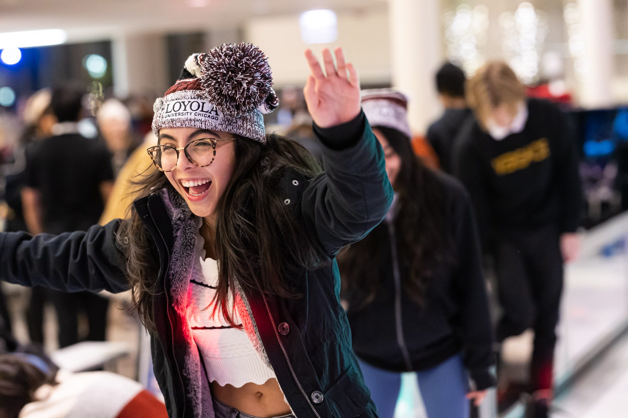 Loyola University Chicago students enjoy the annual Damen Tree Lighting ceremony at the Damen Student Center on November 20, 2024 (Photo: Lukas Keapproth)