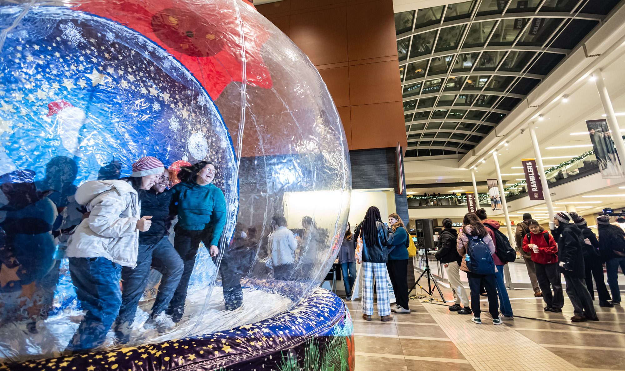 Loyola University Chicago students enjoy the annual Damen Tree Lighting ceremony at the Damen Student Center on November 20, 2024 (Photo: Lukas Keapproth)
