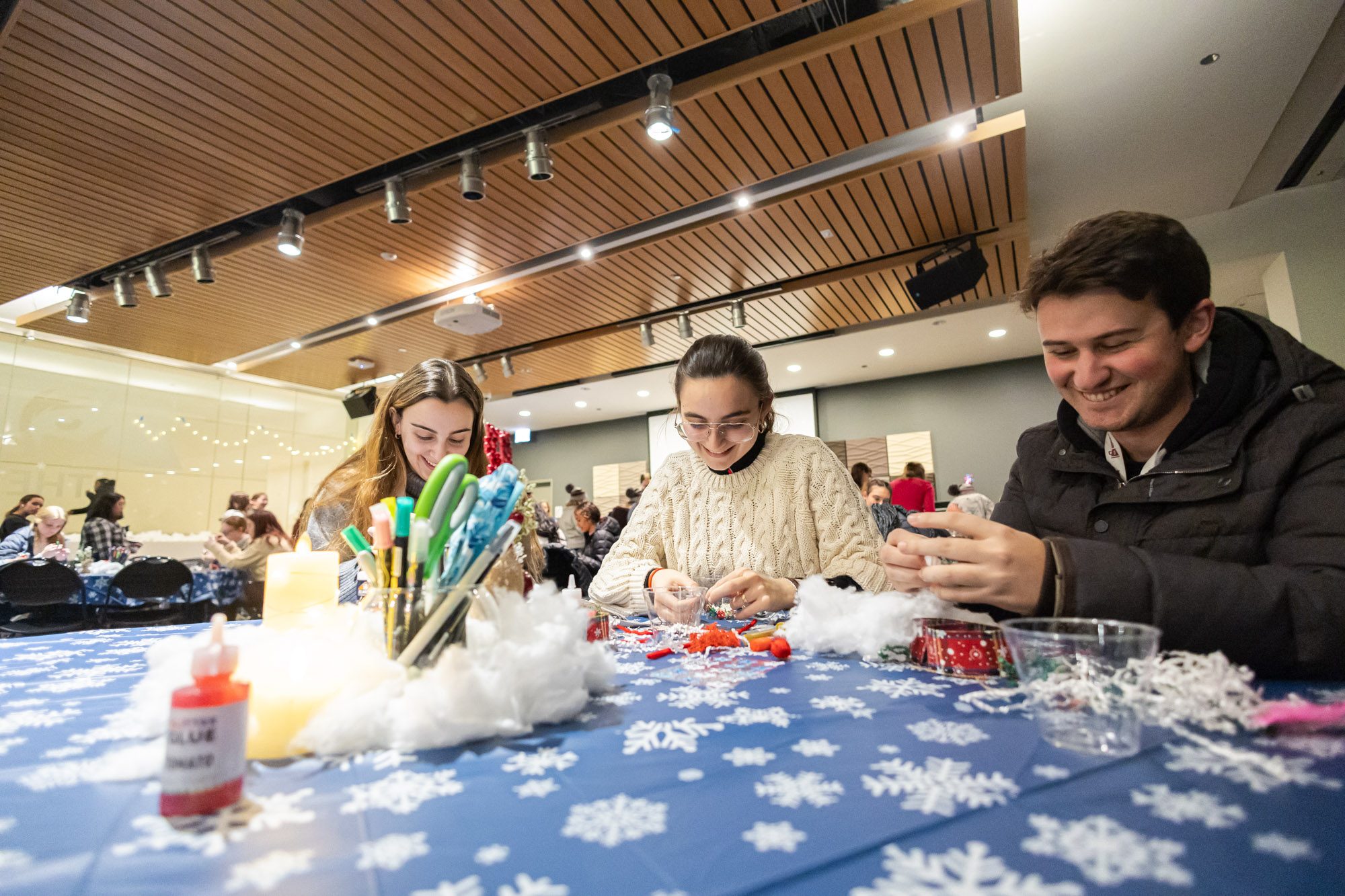 Loyola University Chicago students enjoy the annual Damen Tree Lighting ceremony at the Damen Student Center on November 20, 2024 (Photo: Lukas Keapproth)