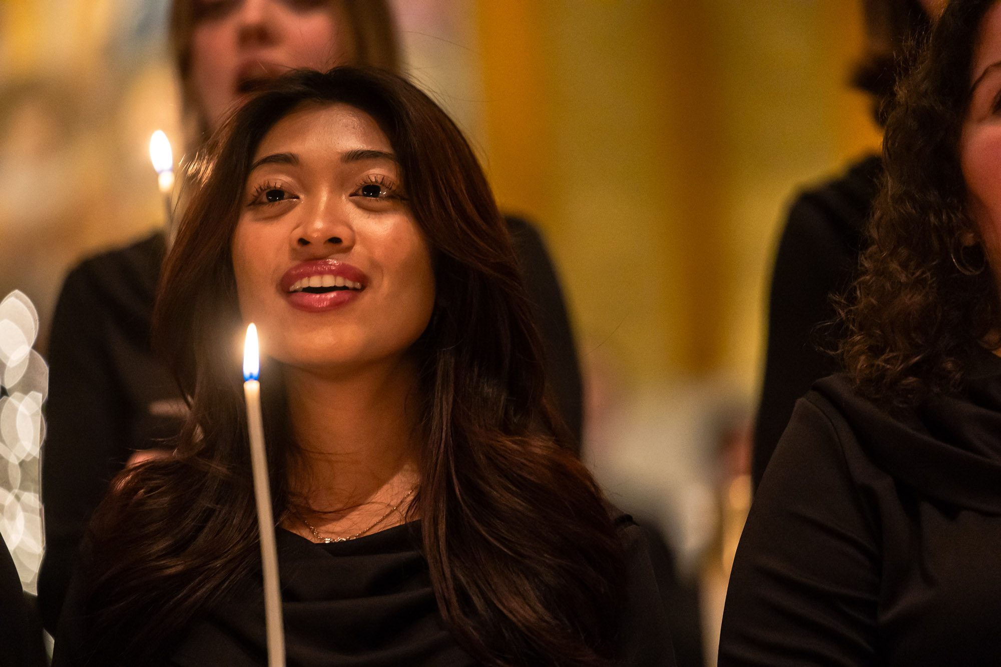 The Loyola chorus ensemble performs at Lessons and Carols, a holiday service that combines scripture readings with liturgical music in Madonna Della Strada Chapel, December 7, 2024. (Photo: Lukas Keapproth)