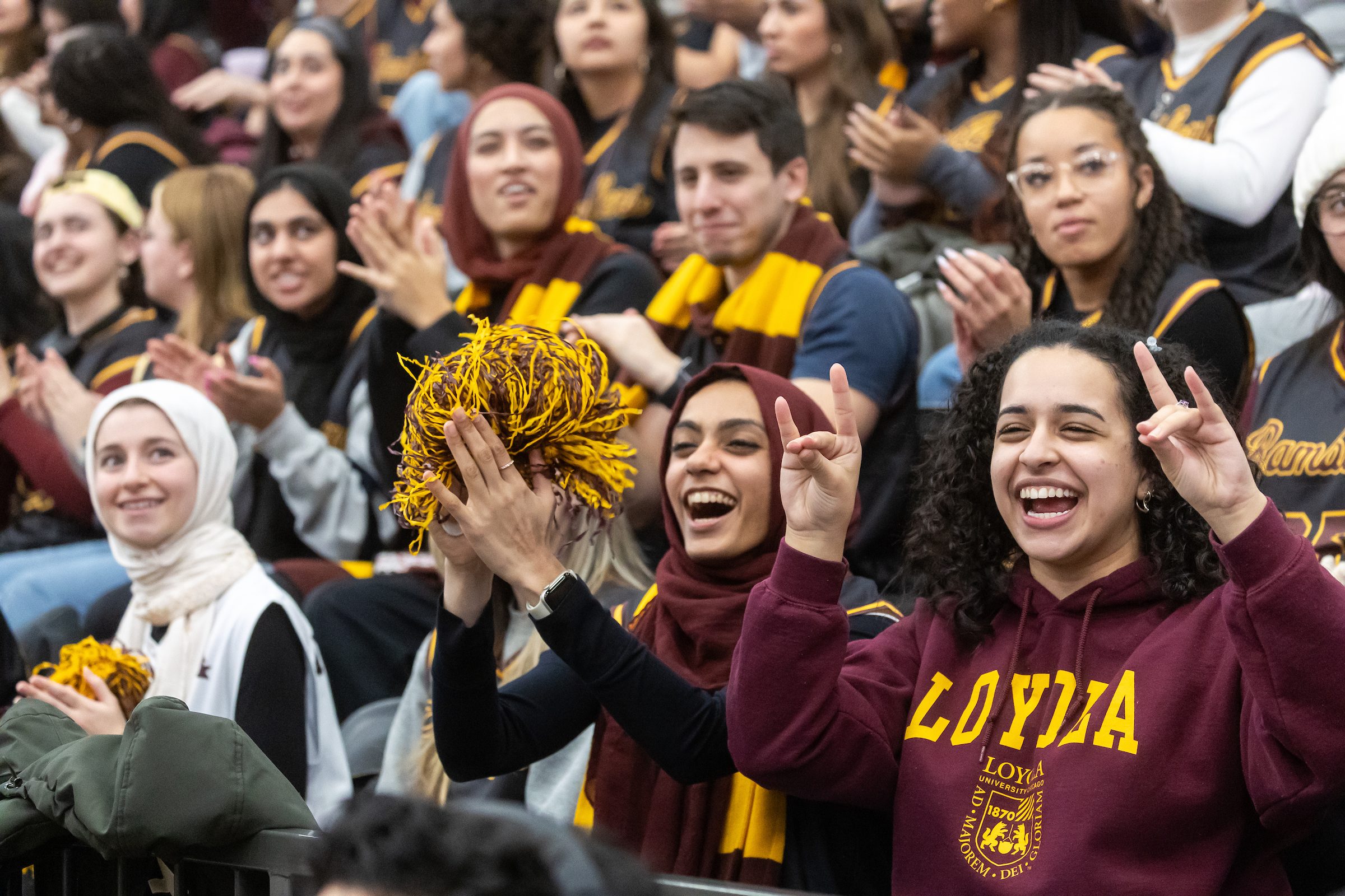 Students cheer on the Ramblers during a men's basketball game on Jan. 22. The Ramblers beat Fordham 70-66. Loyola University Chicago students cheer for the men's basketball team