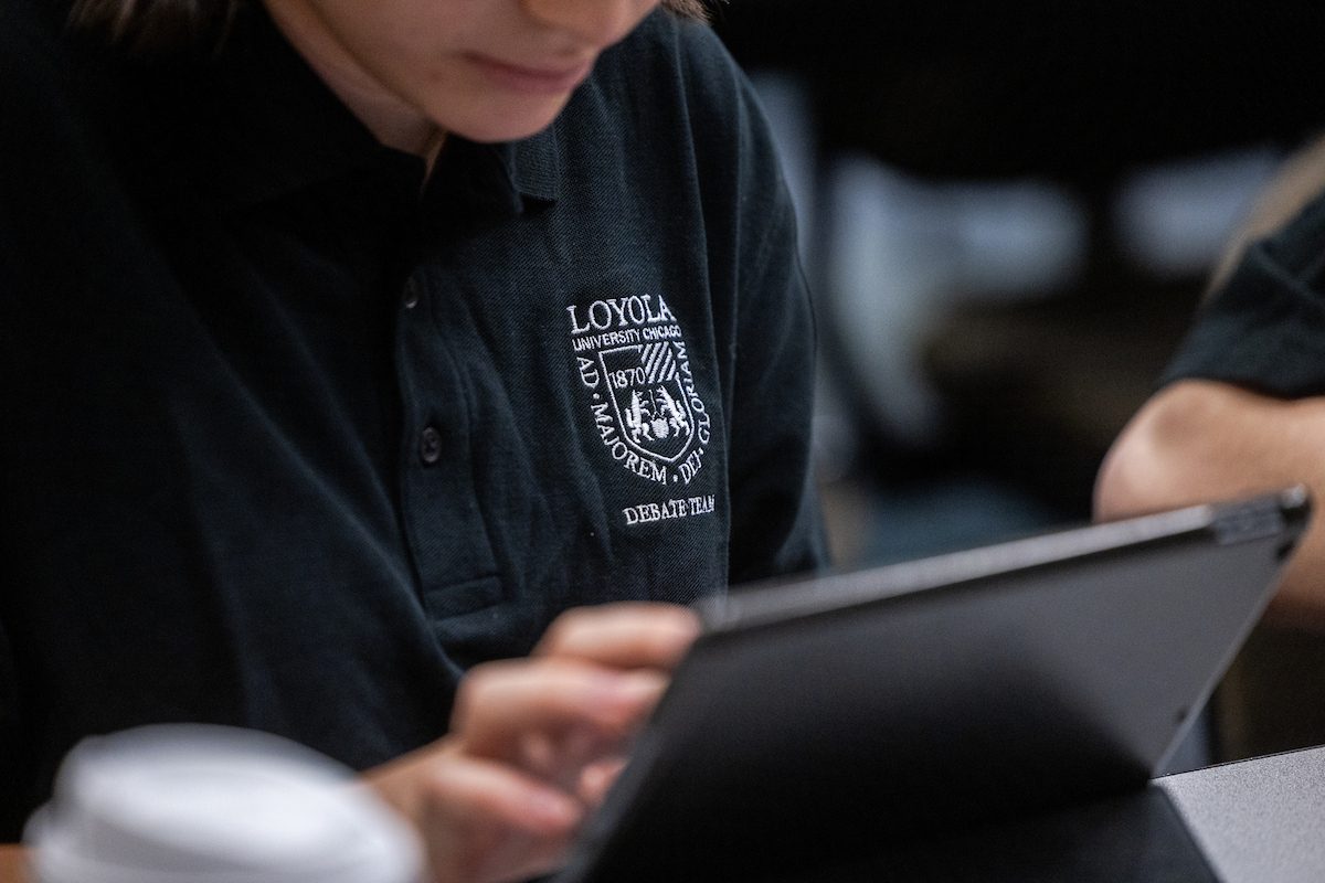 Members of the Loyola Debate Team compete at the Civic Debate Consortium’s Social Justice Debates Fall Championship, held in the Corboy Law School on November 16, 2024. (Photo: Lukas Keapproth)