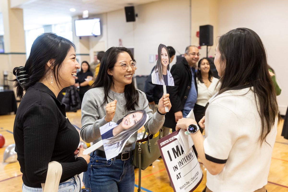Loyola physicians-in-training react as they receive their residency matches during Loyola University Chicago Stritch School of Medicine's Match Day celebration in Maywood on Friday, March 21, 2025.(Photo by: Lukas Keapproth)