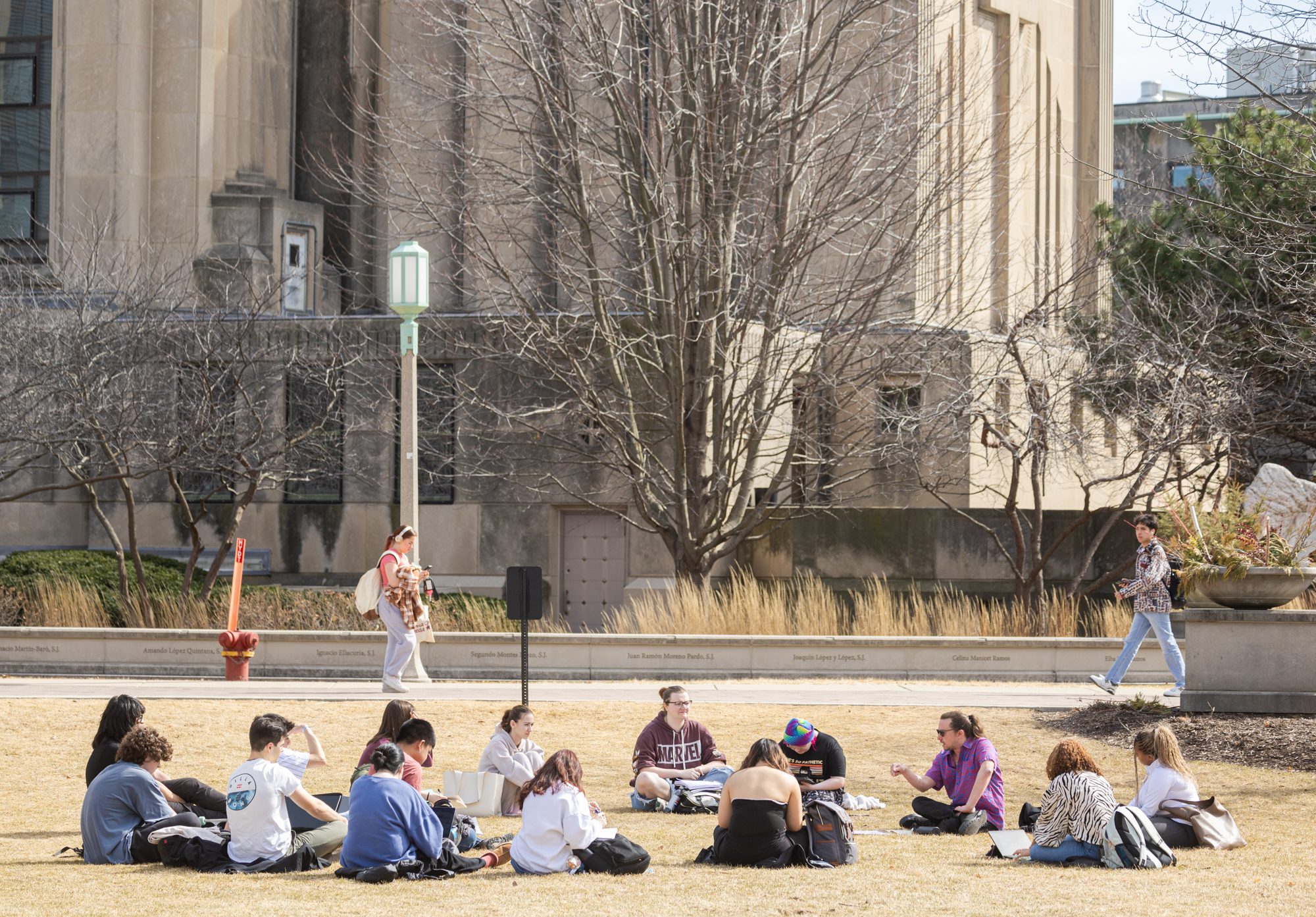 Professors opted to host classroom discussions outside on the East Quad on warm weather days. 