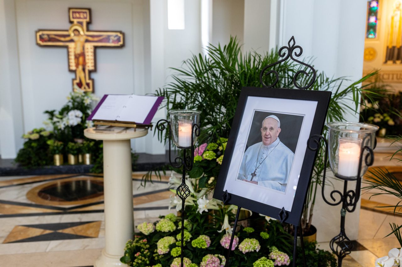 A photo of Pope Francis sits in Madonna Della Strada Chapel as part of a memorial after his death.