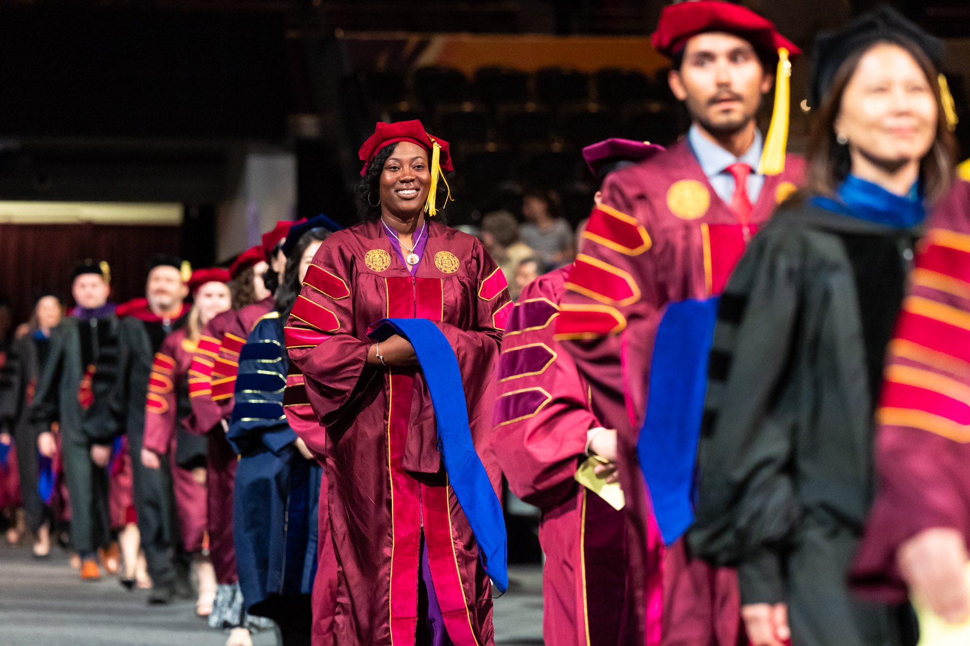 Doctorate students and their mentors enter Gentile Arena for the start of the Institute for Pastoral Studies and Graduate School commencement ceremony on May 6th.