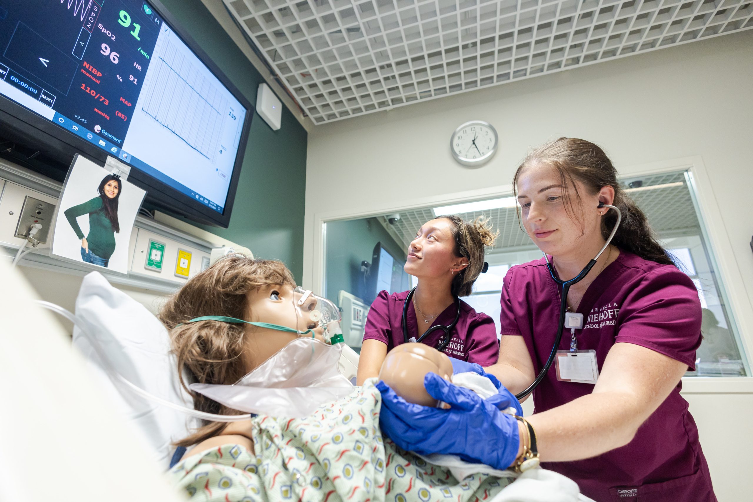 A new nursing and science building will include state-of-the art simulation labs, where nursing undergraduates learn clinical skills before treating human patients. Here, Marcella Niehoff School of Nursing students practice delivering a baby using high-tech