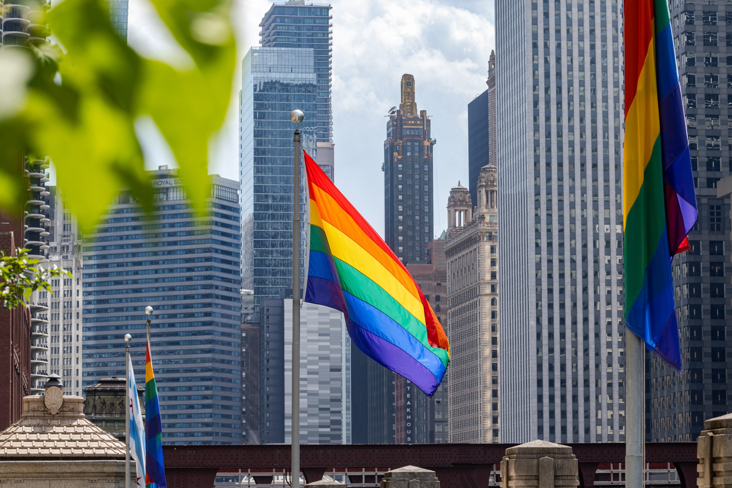 Pride flags fly near the Chicago River in honor of Pride Month in downtown Chicago on June 26, 2026.
