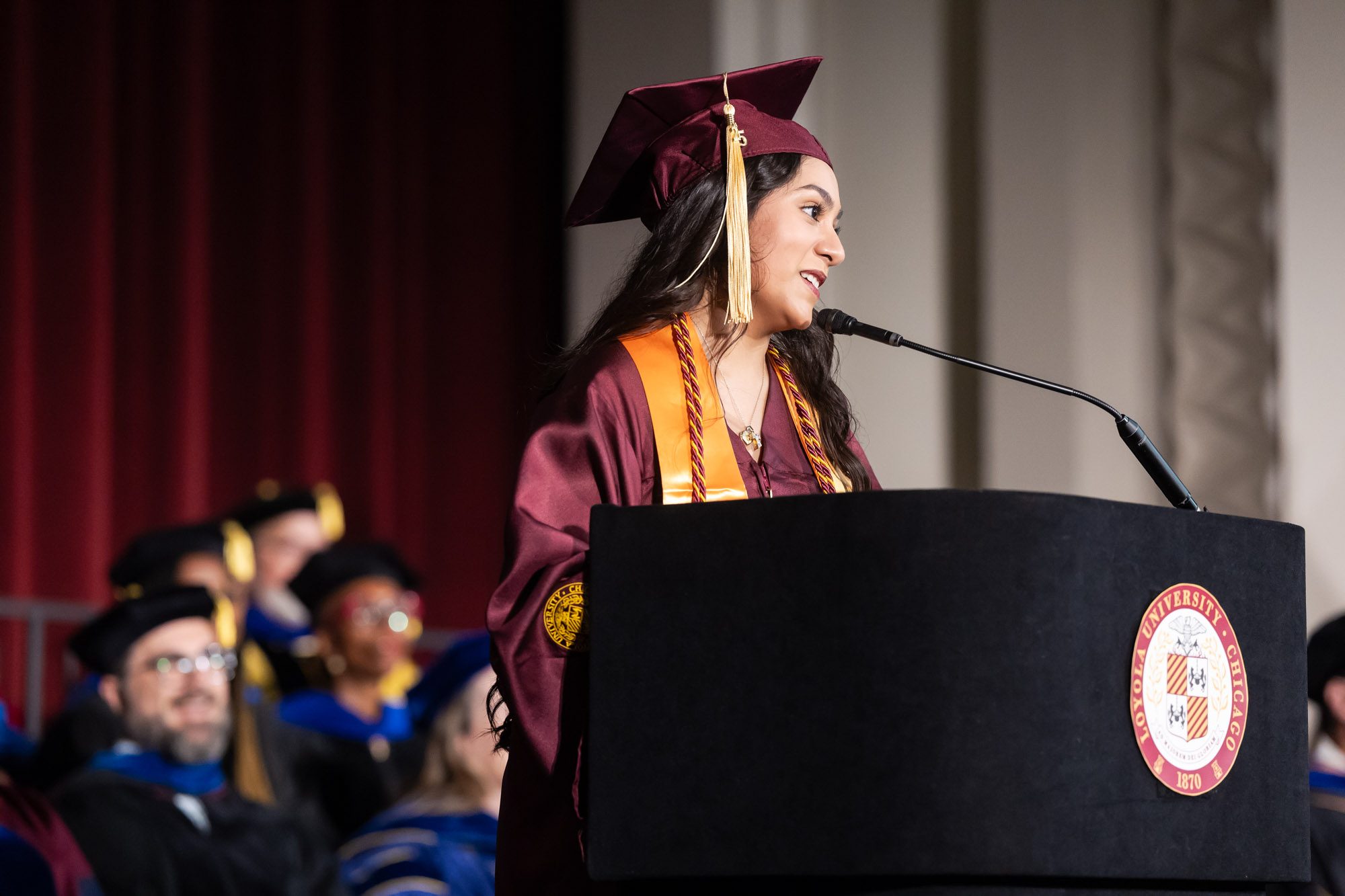 Arrupe College celebrates during its commencement, with former Loyola president Fr. Michael Garanzini as the commencement speaker, August 16, 2025. (Photo: Lukas Keapproth)