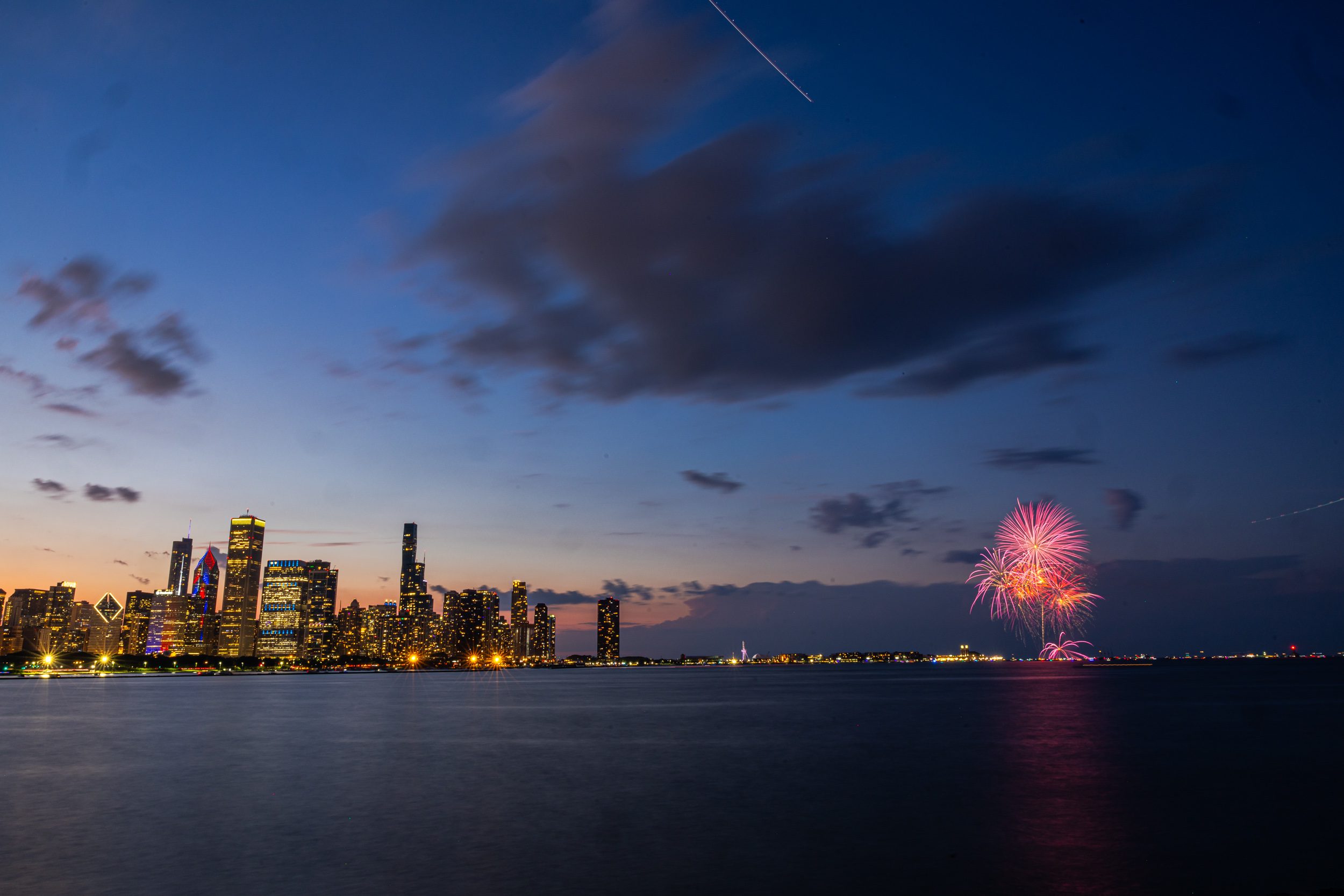 Fourth of July fireworks burst over Navy Pier.