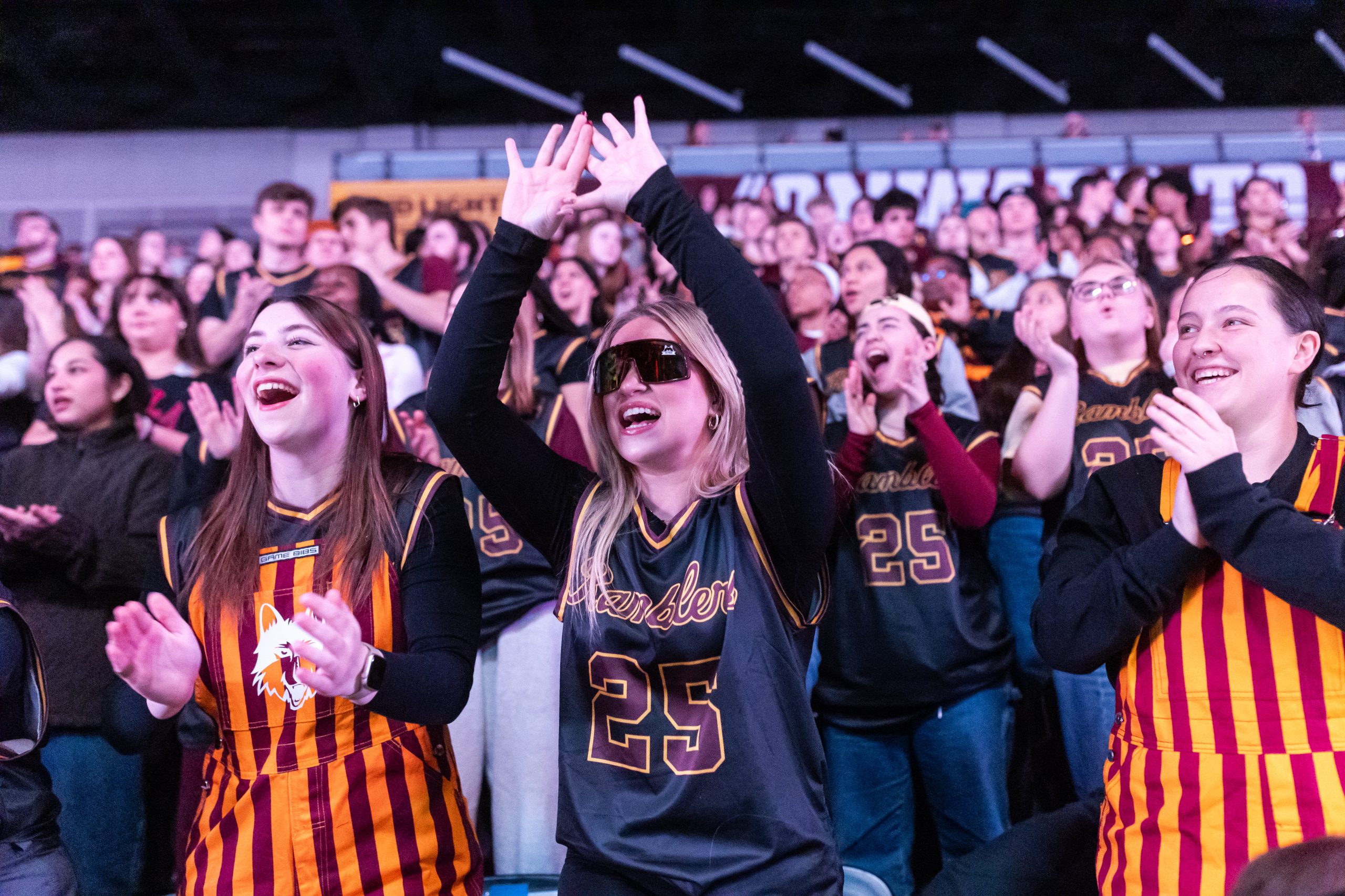 Students pack Gentile Arena to cheer on the Rambler Men's Basketball team.