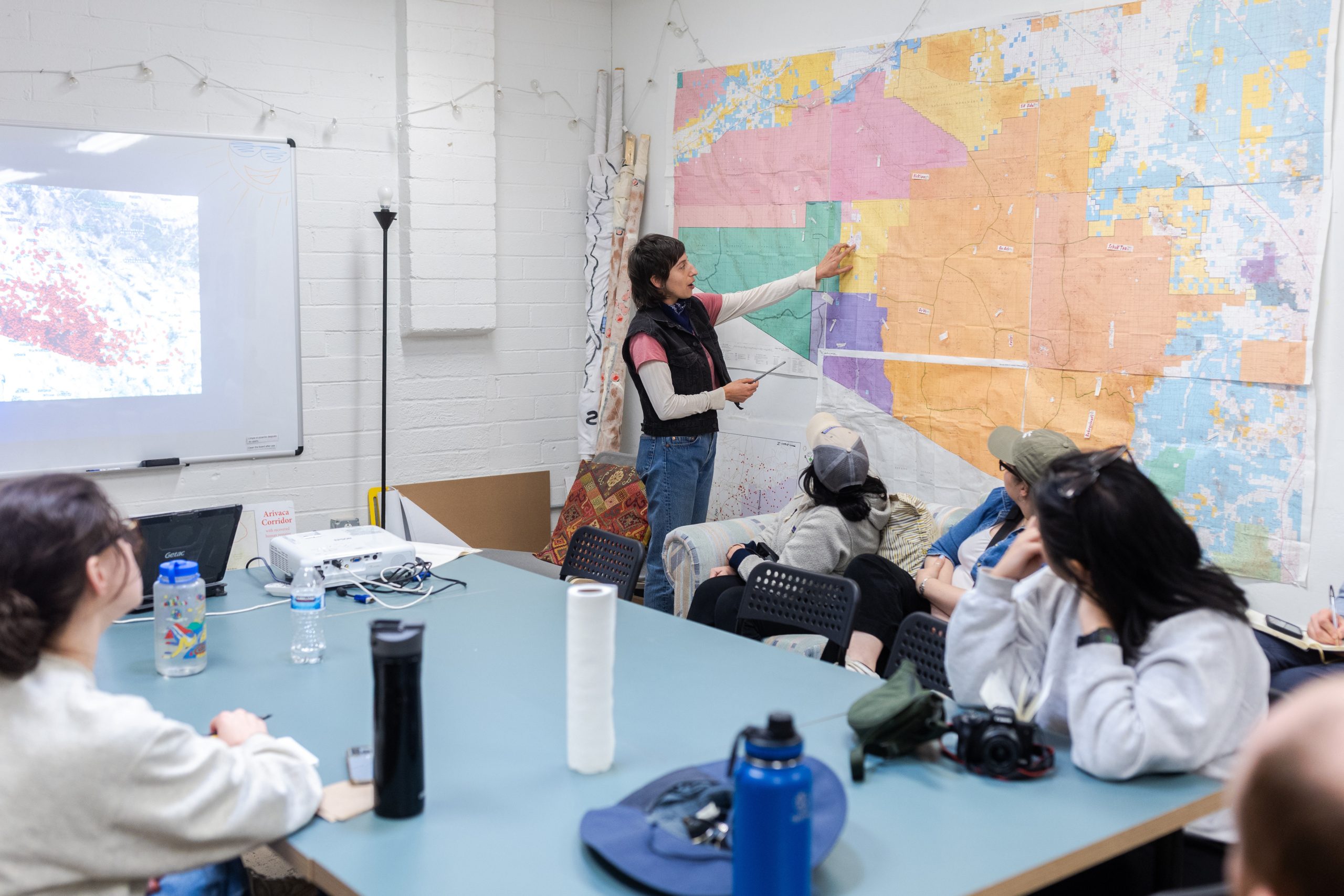 Volunteers with No More Deaths, a humanitarian organization working along the U.S.-Mexico border, present to Loyola University Chicago law students during the immersion trip.
