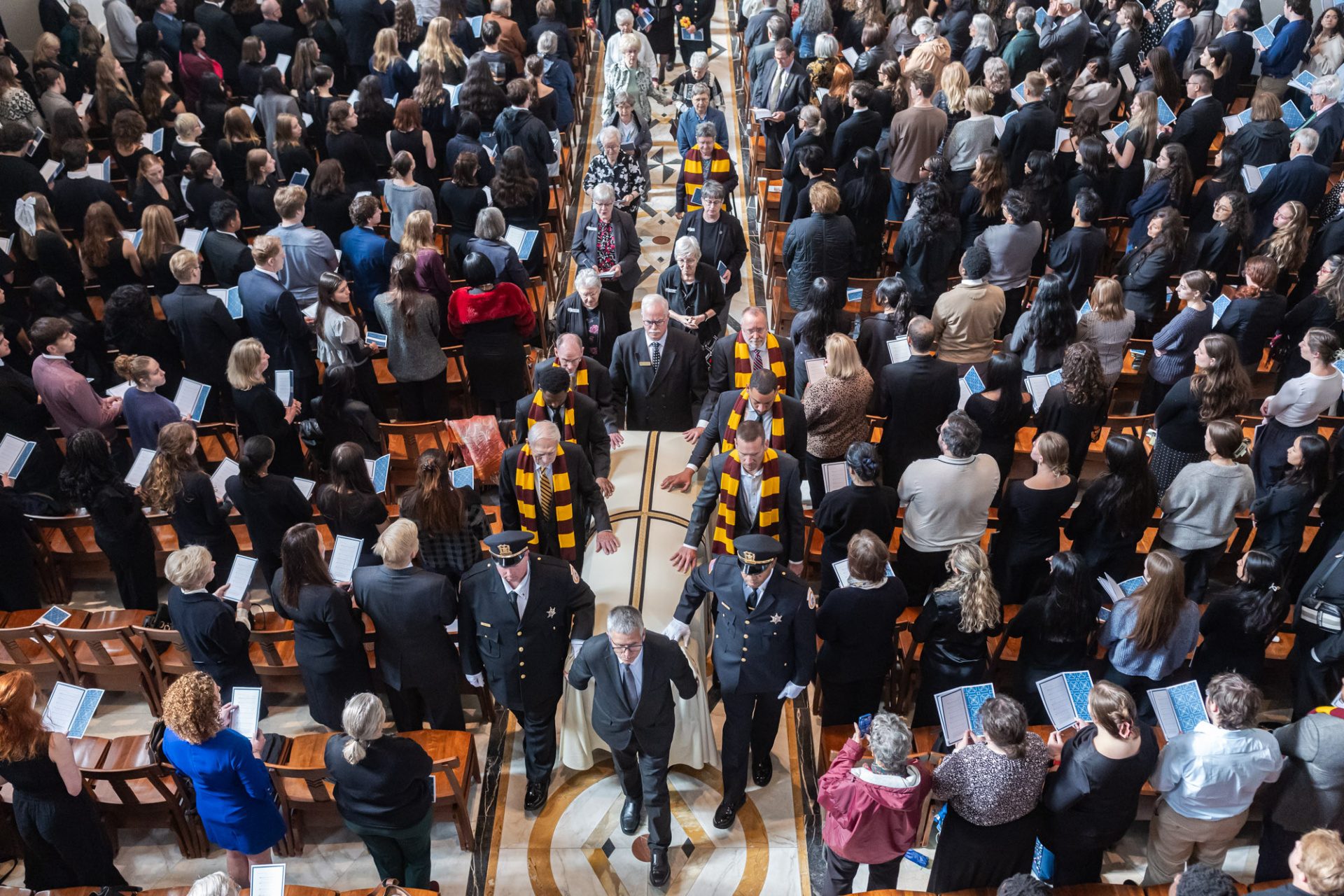 The Loyola University Chicago community gathers to celebrate the life of Sister Jean Dolores Schmidt, BVM, at Madonna della Strada chapel on October 16, 2025. (Photo: Lukas Keapproth)