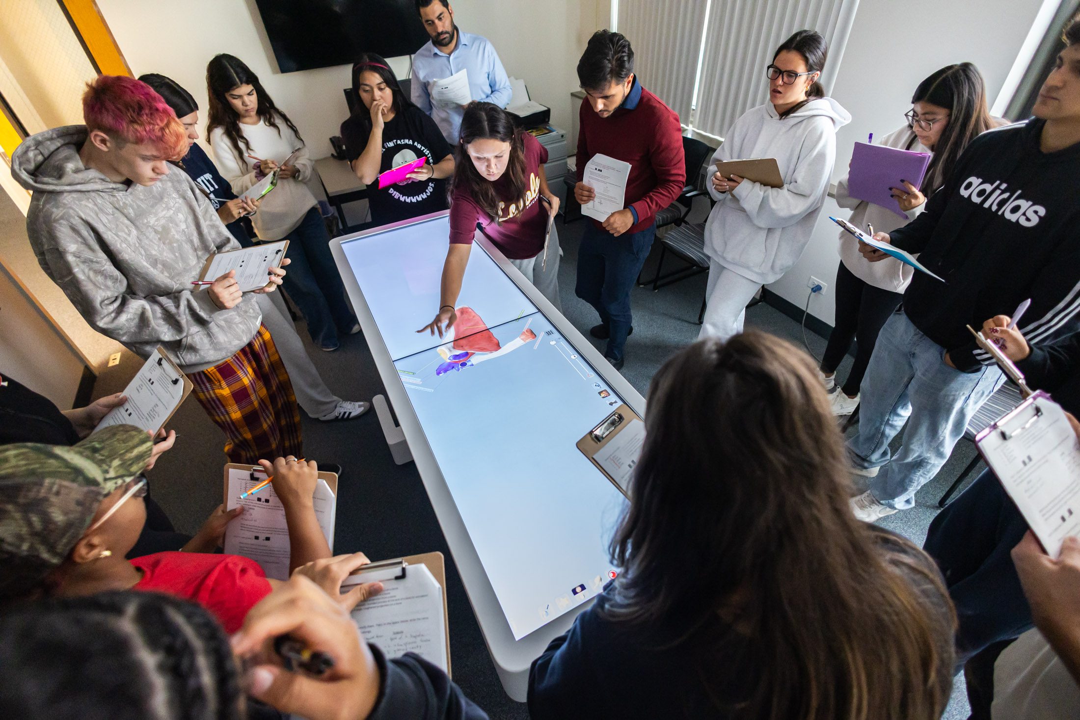Loyola Parkinson School of Health Sciences and Public Health students used an Anatomage Virtual Cadaver Table to label different structures of the human body during Assistant Professor Georgios Grigoriadis's anatomy course.