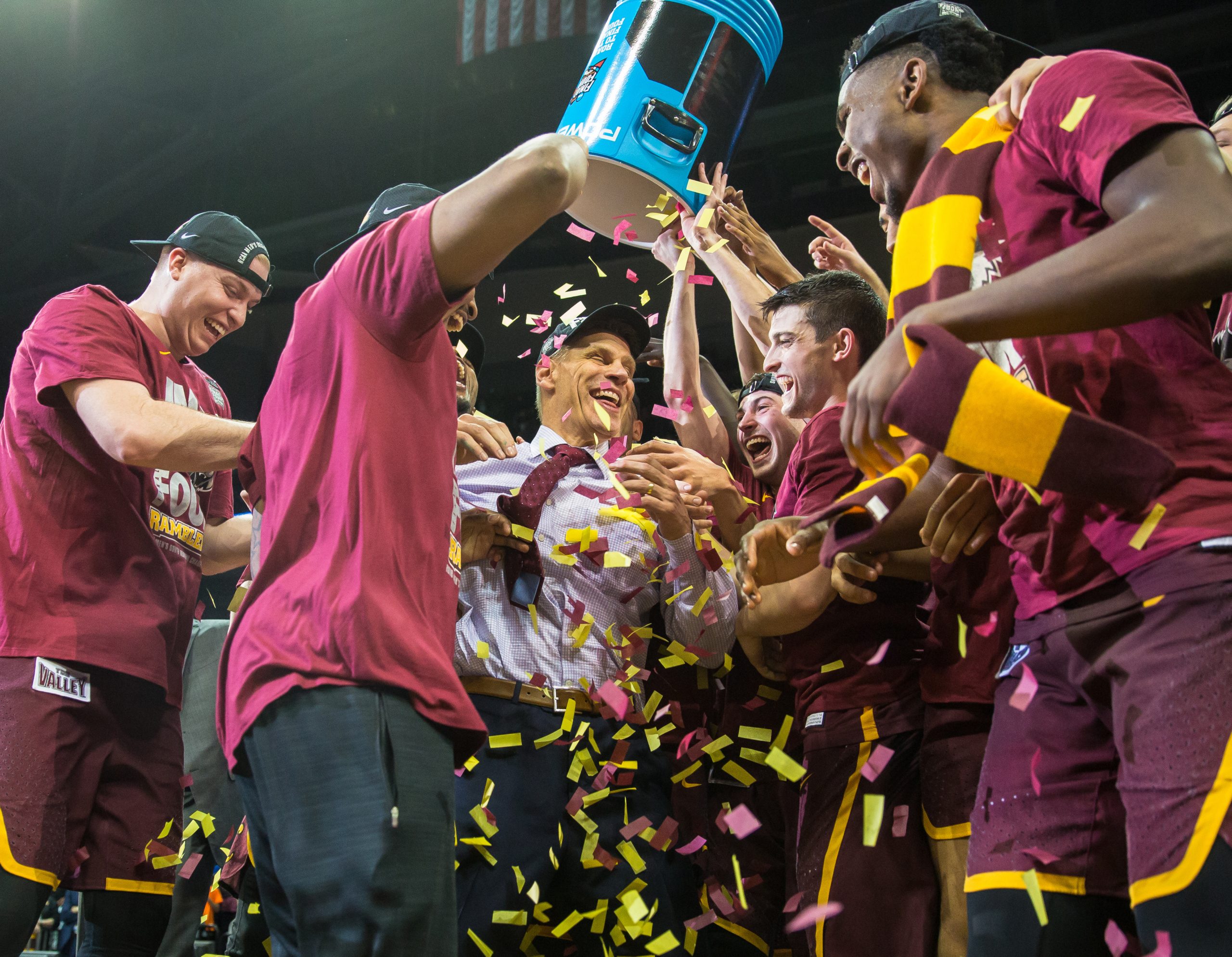 Loyola University Chicago players celebrate after beating Kansas State to advance to the Final Four in the NCAA Tournament at Philips Arena in Atlanta, Georgia, on March 24, 2018. (Photo: Lukas Keapproth)