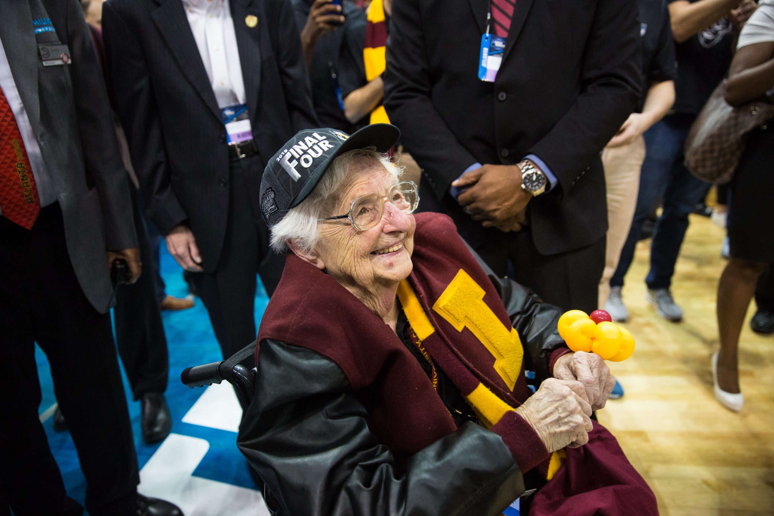 With tears in her eyes, Sister Jean watches the Loyola University Chicago players cut down the nets after beating Kansas State to advance to the Final Four at Philips Arena in Atlanta, Georgia, on March 24, 2018. (Photo: Lukas Keapproth)