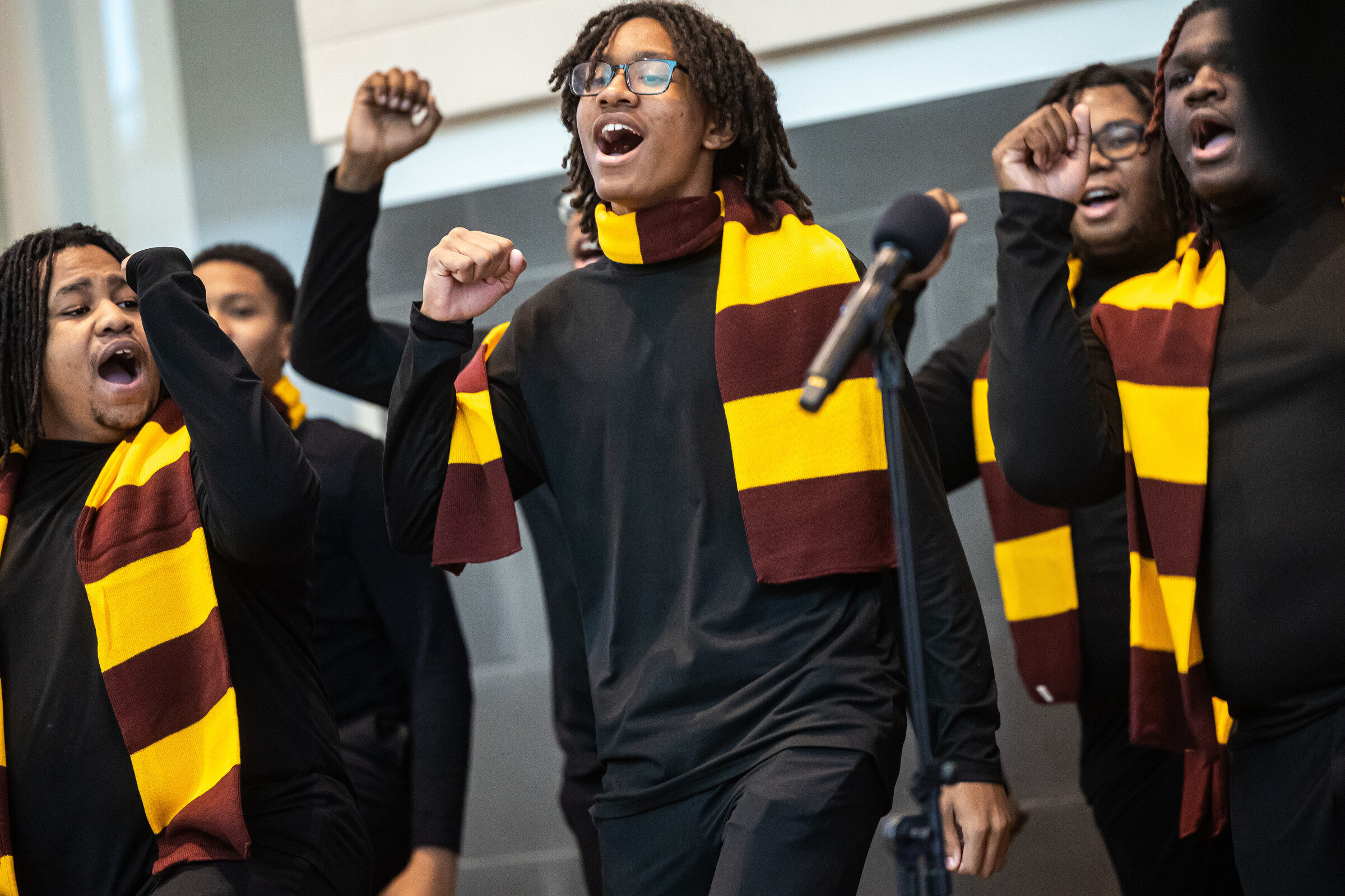 Members of the Leo High School boys choir sing in the Damen Student Center as part of Black History Month festivities.