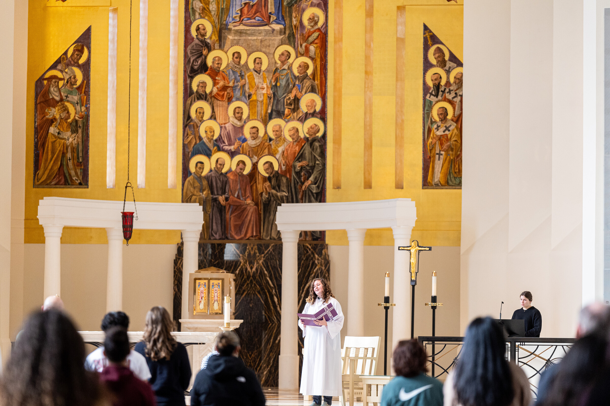 Loyola community members gather for Ash Wednesday mass in Madonna della Strada Chapel.