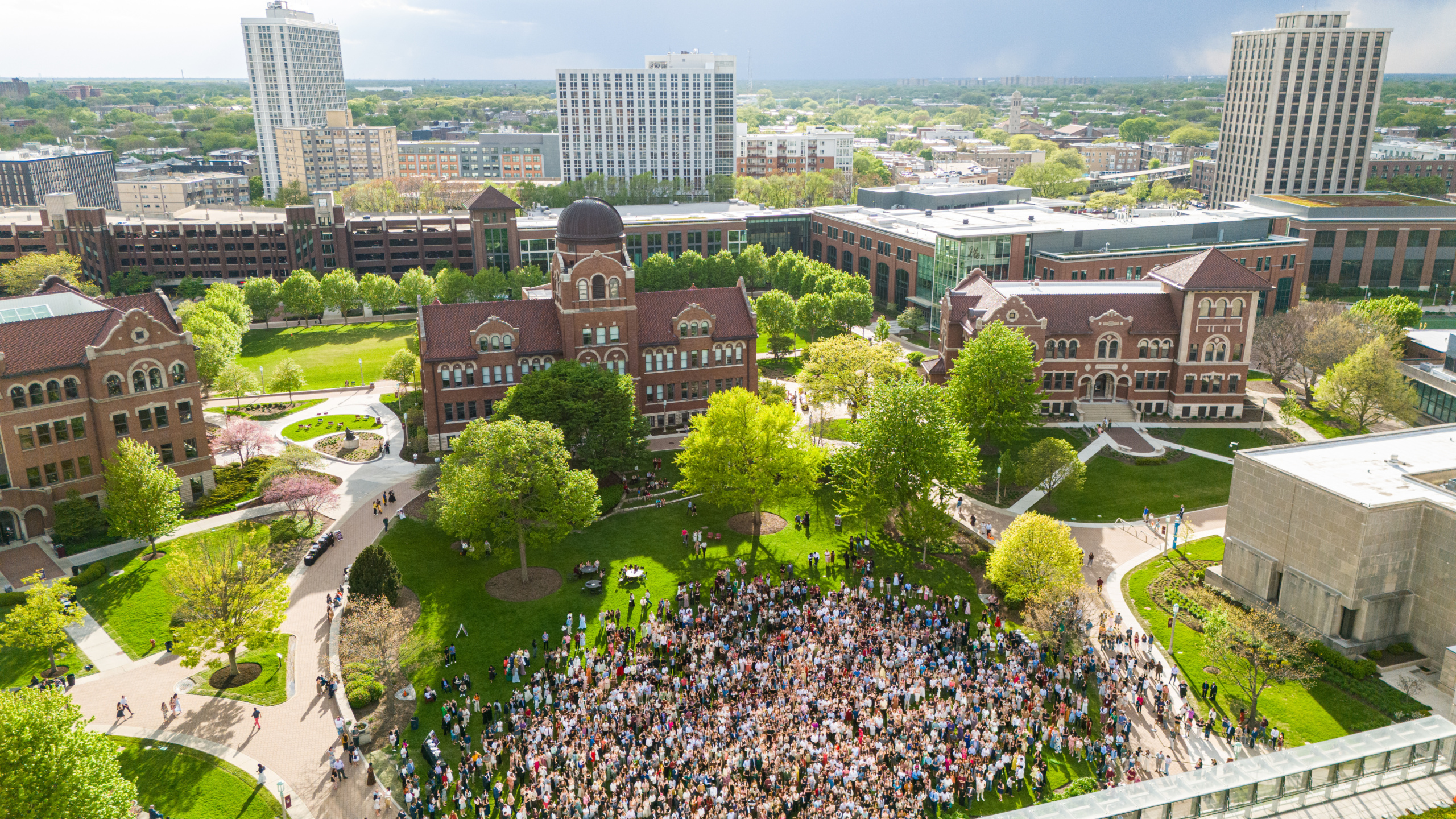 Seniors gathered on the East Quad to toast to their accomplishments and walk through the Cudahy Library doors for the last time.