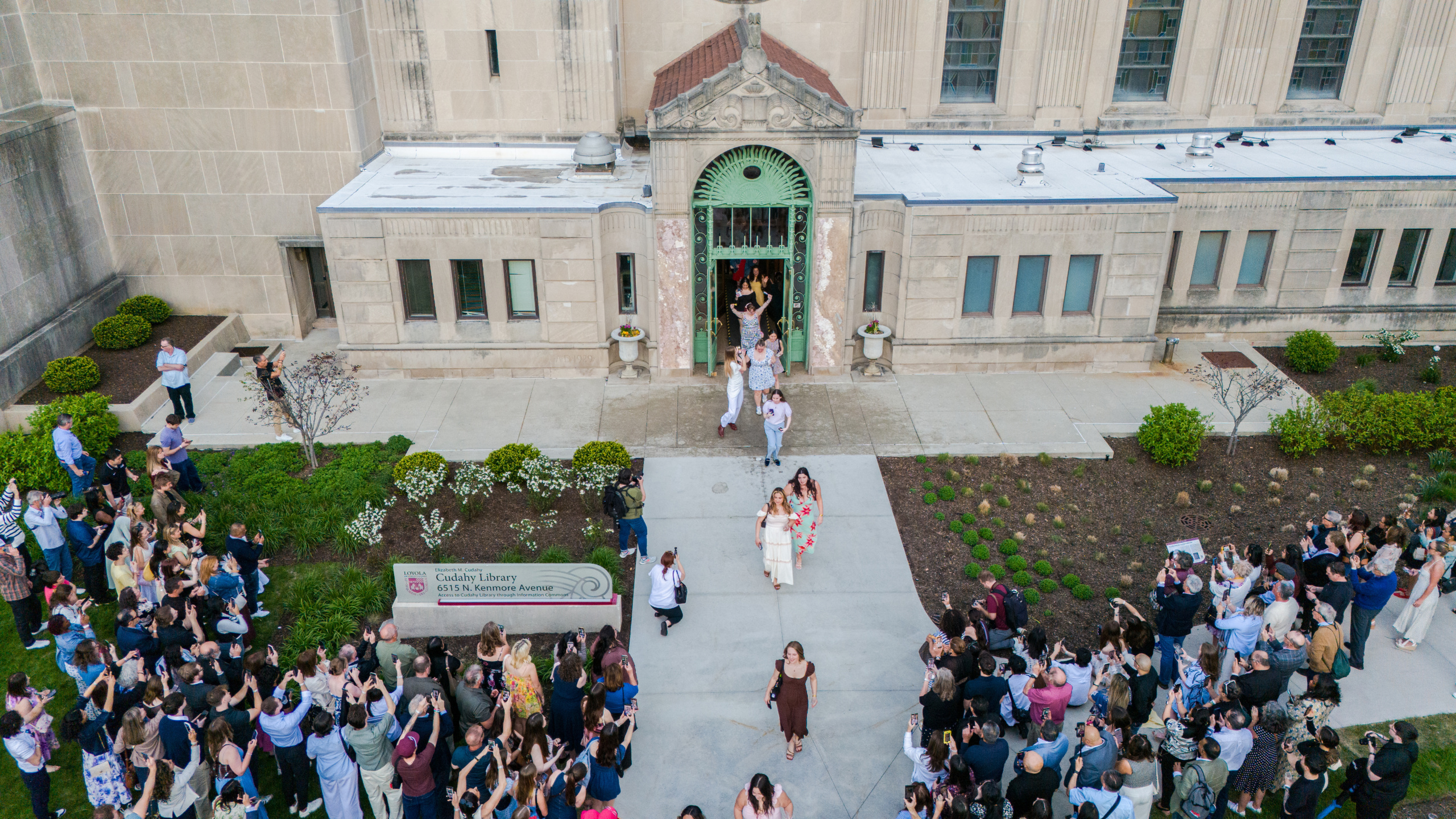 The Class of 2026 walks through the Cudahy Library doors for the last time at Senior Toast on Monday, May 4.