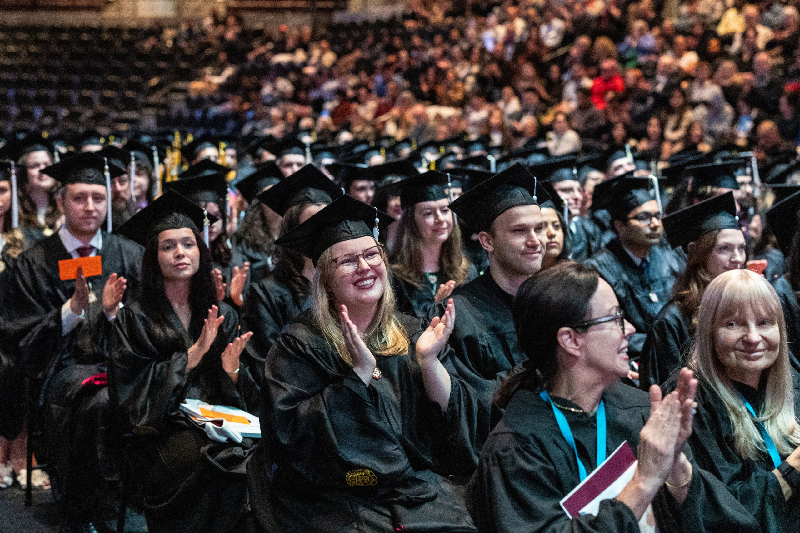 Loyola University Chicago graduates from the Institute for Pastoral Studies and the Graduate School attend their commencement ceremony in Gentile Arena on May 5, 2026. Reuben Miller (PhD '13) was the keynote speaker. 
