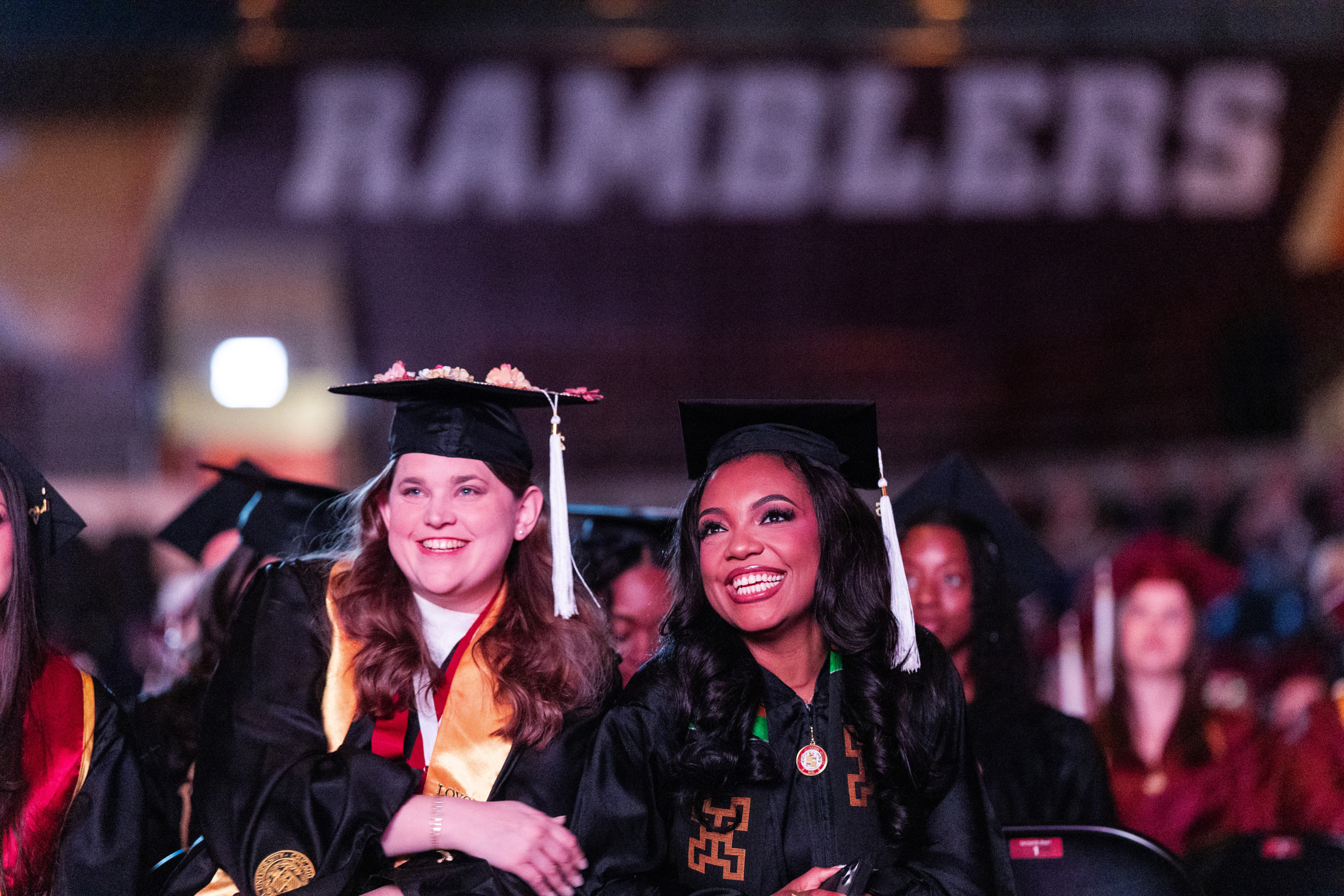 Loyola University Chicago graduates from the School of Communication and School of Continuing and Professional Studies attend their commencement ceremony in Gentile Arena on May 6. Lou Canellis (BA '87) was the keynote speaker.