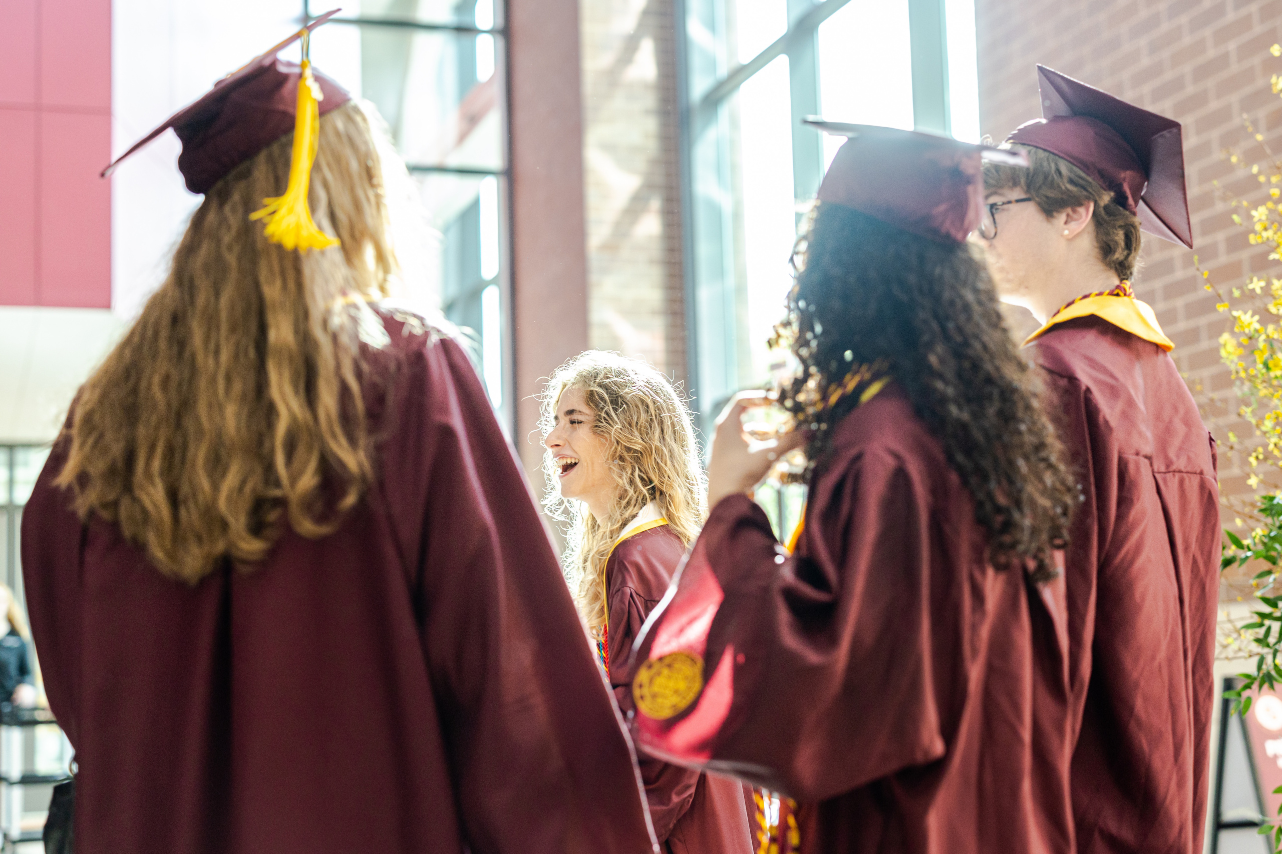 Loyola University Chicago graduates from the College of Arts and Sciences prepare to attend their commencement ceremony in Gentile Arena on May 8, 2026. Joy Jordan (BA '08) was the keynote speaker.