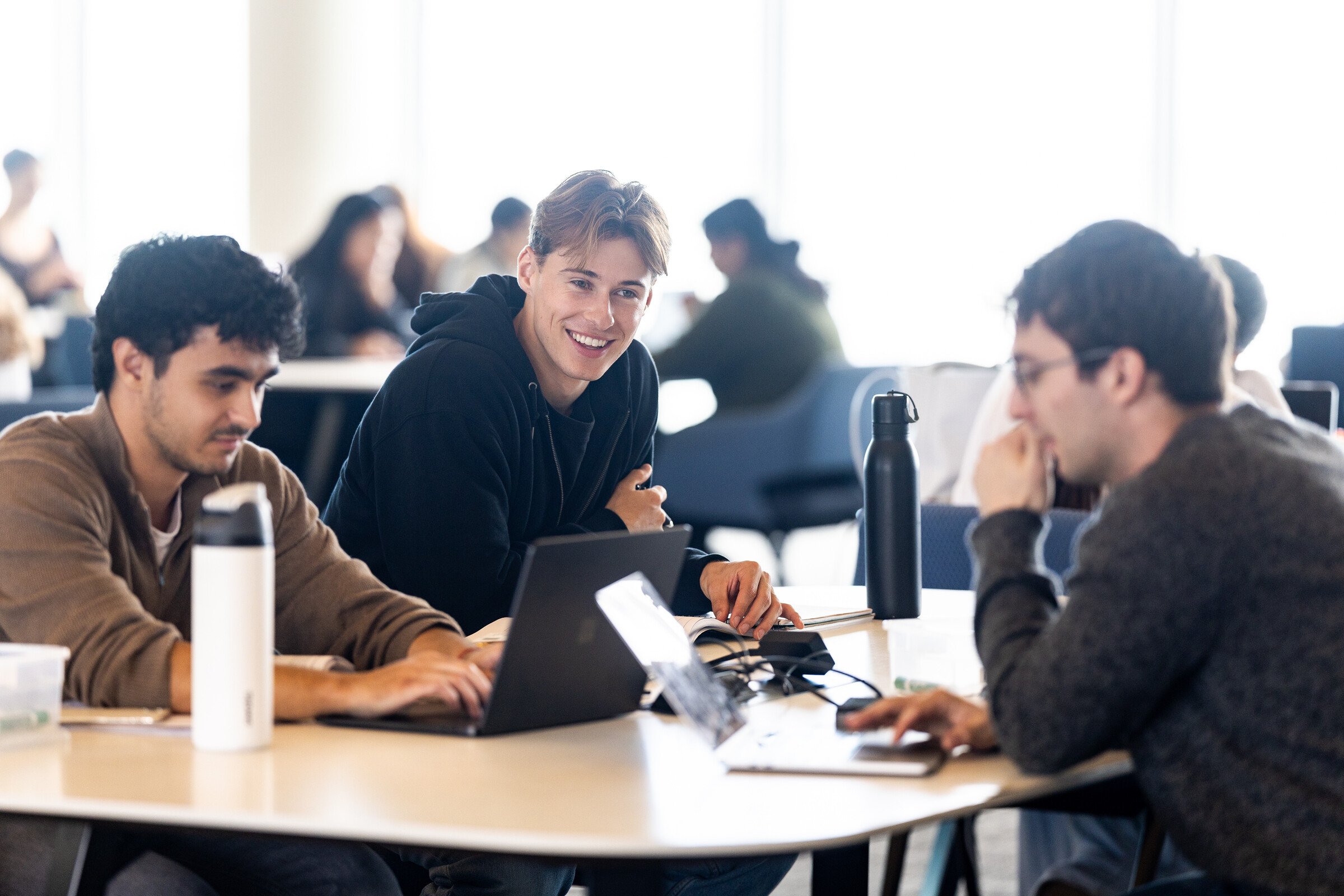 Loyola students study in Information Commons library before midterm exams.